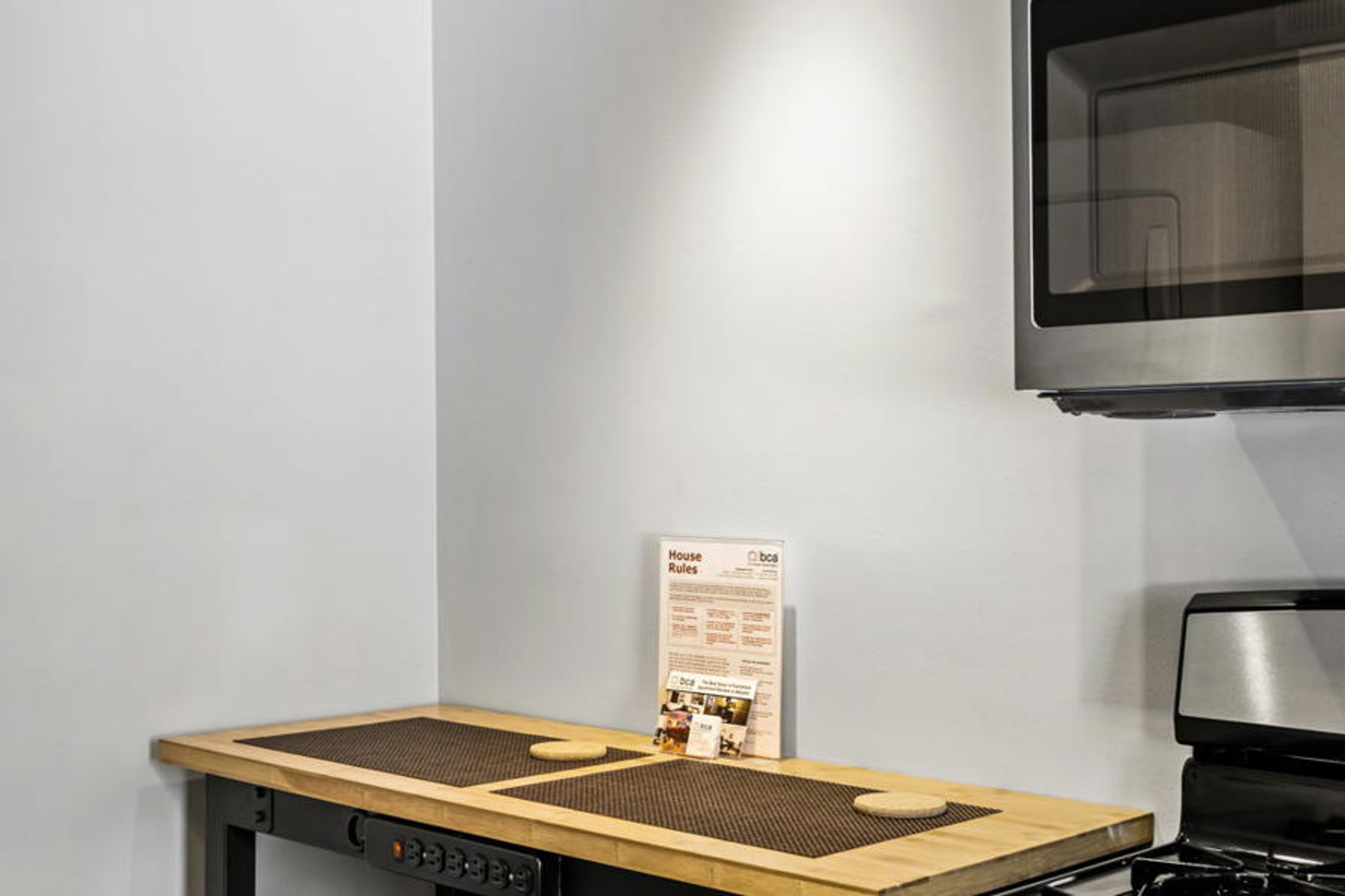 Brookwood Courtyard Condos - Kitchen - Bamboo Bar Table has Charging