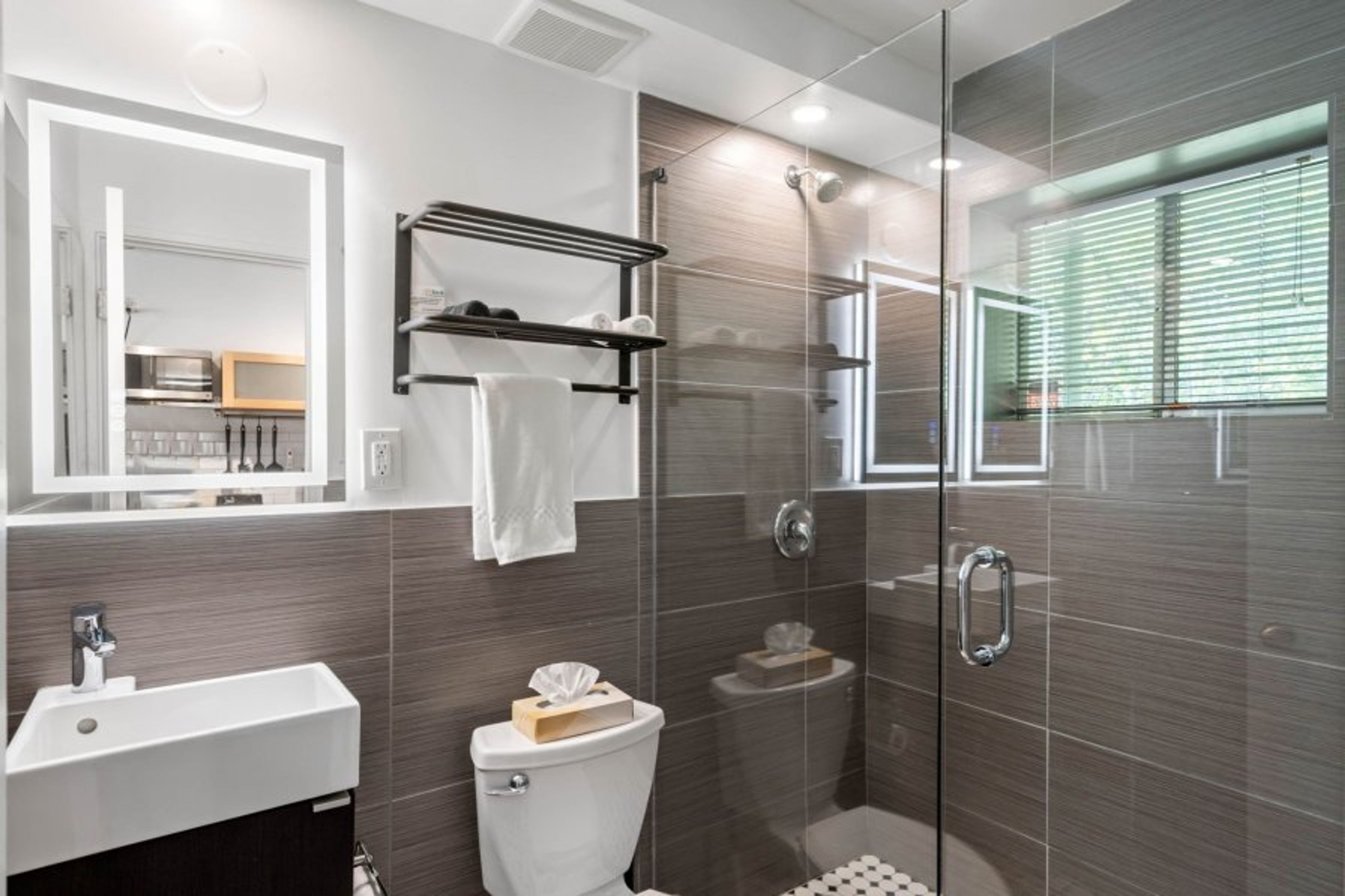 Bathroom with Glass Walk-in Shower - Furnished Apartments in Atlanta - Chic Premium Studios On 25th