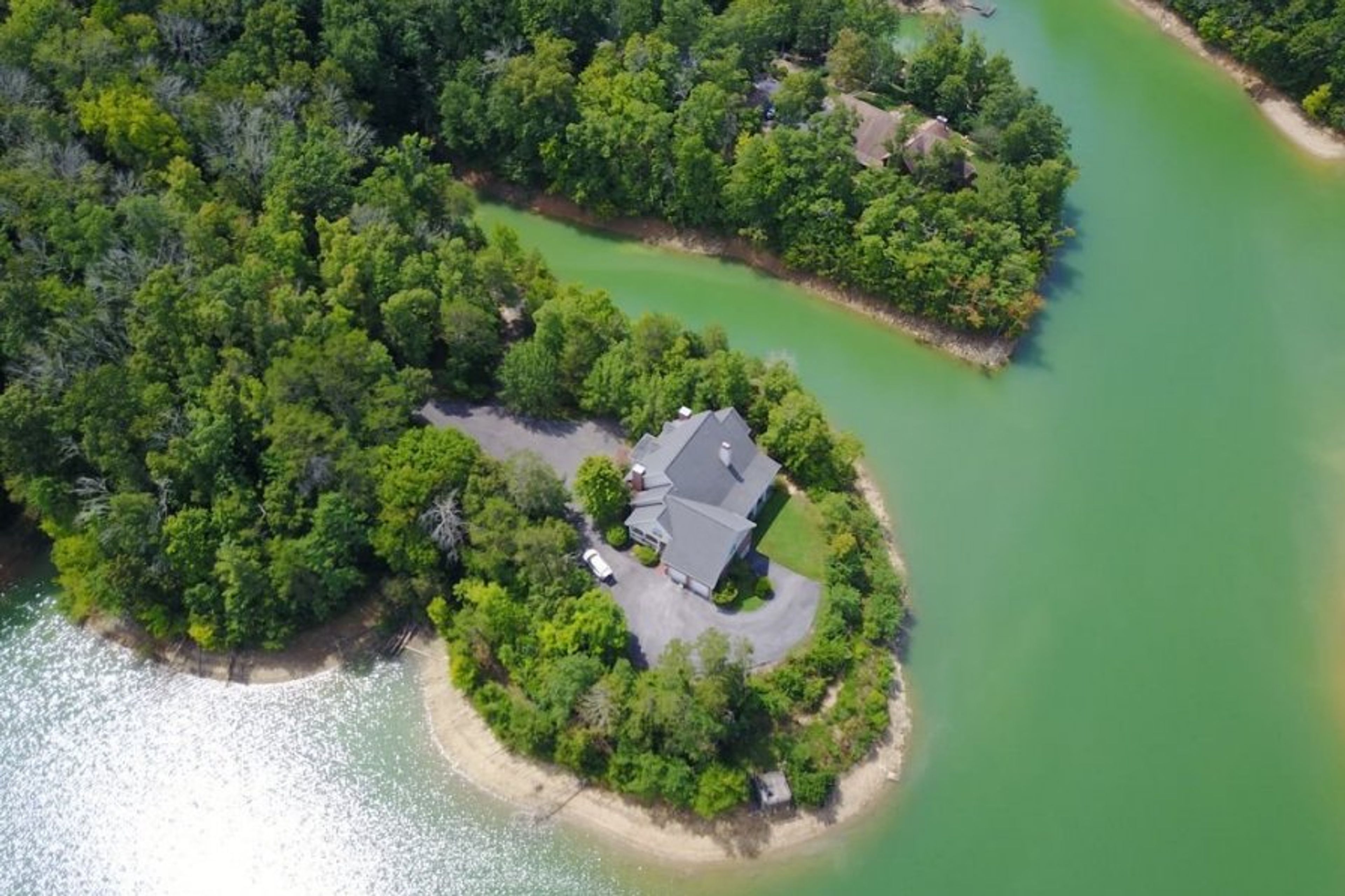 Aerial view of the Lake House & gated 5 acre private peninsular