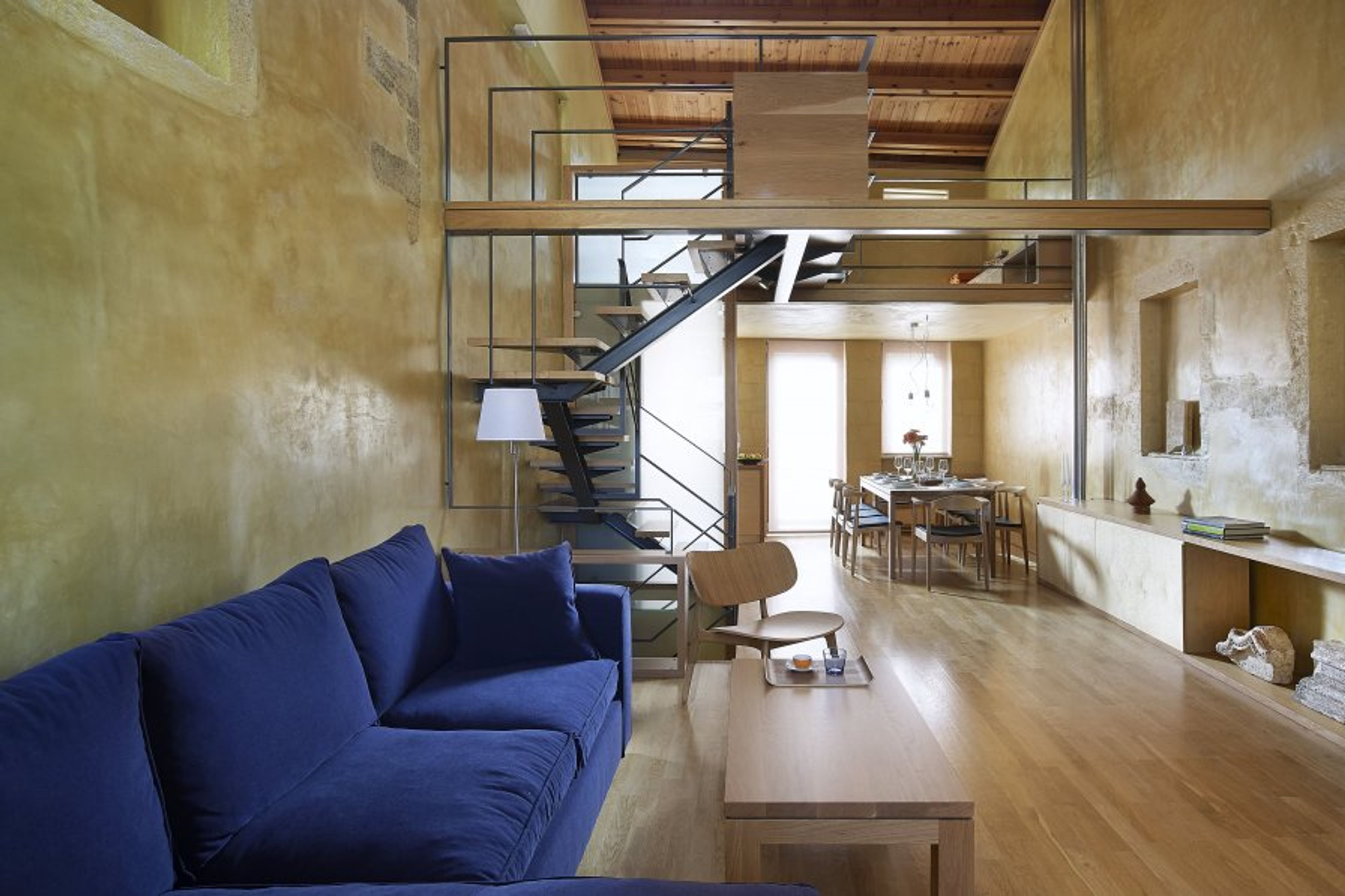 The second floor is dedicated to an open and airy living space. 