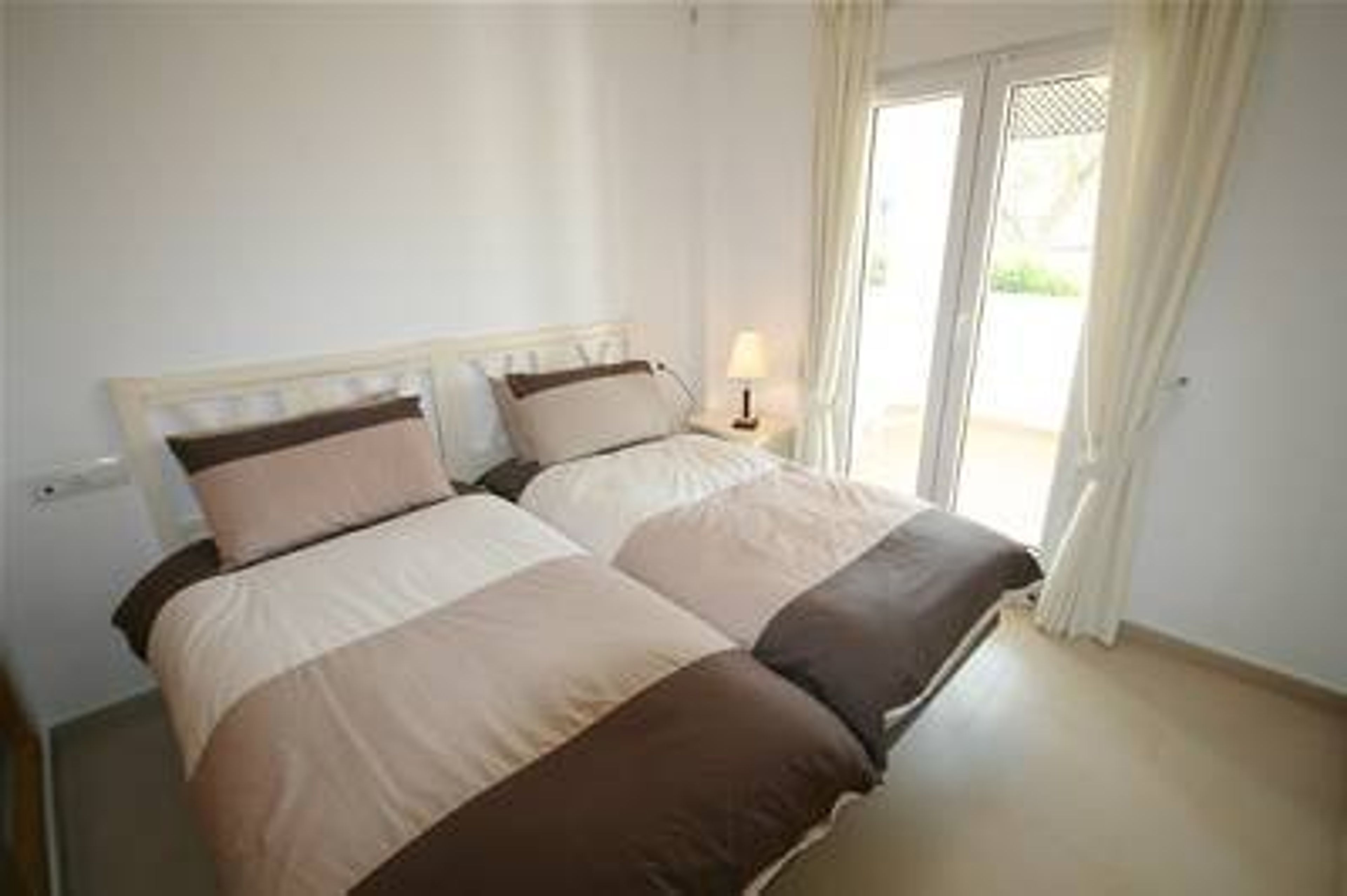 Twin Bedroom 2 - Leading On To The Patio