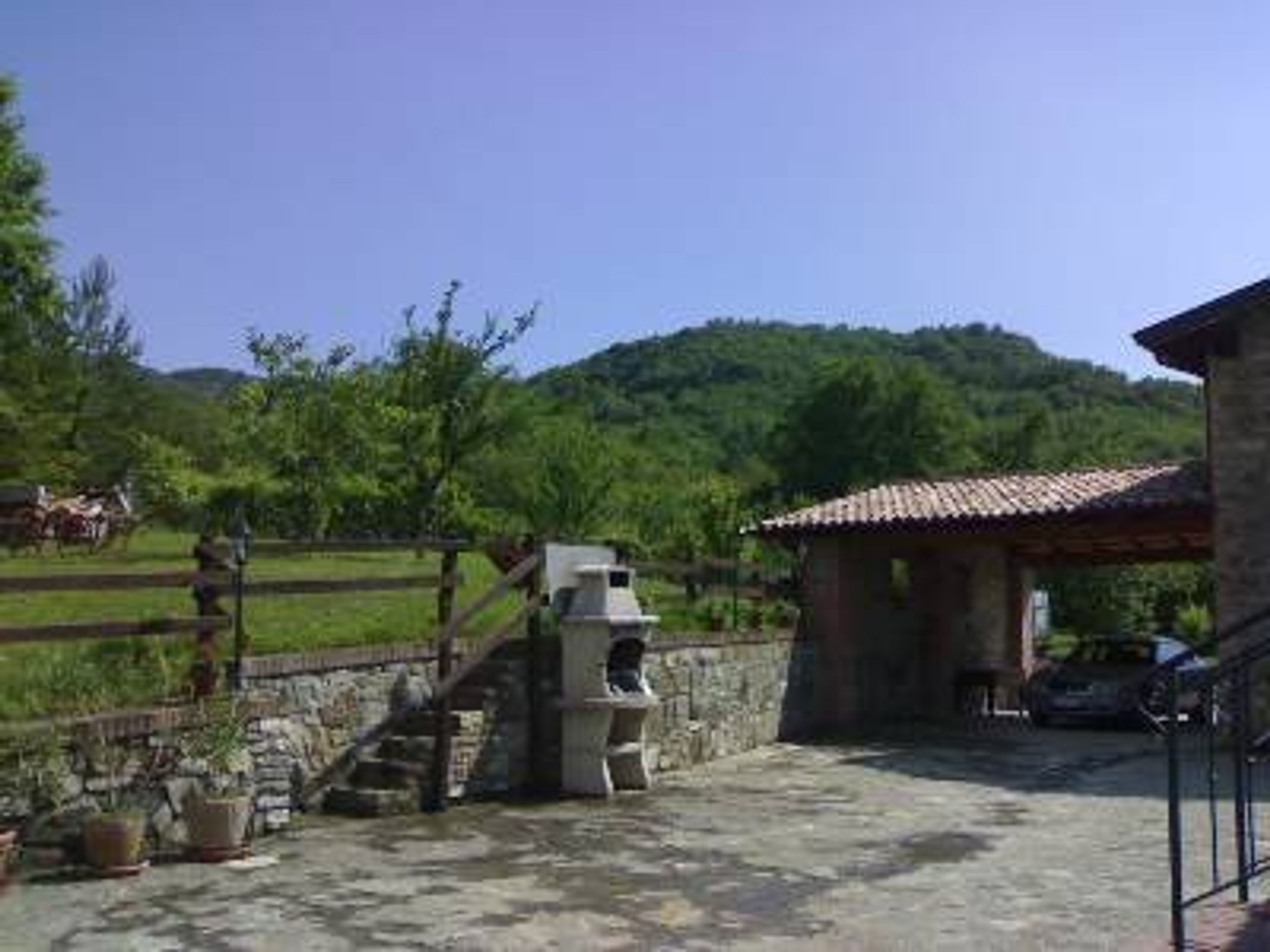 The car port and bbq area