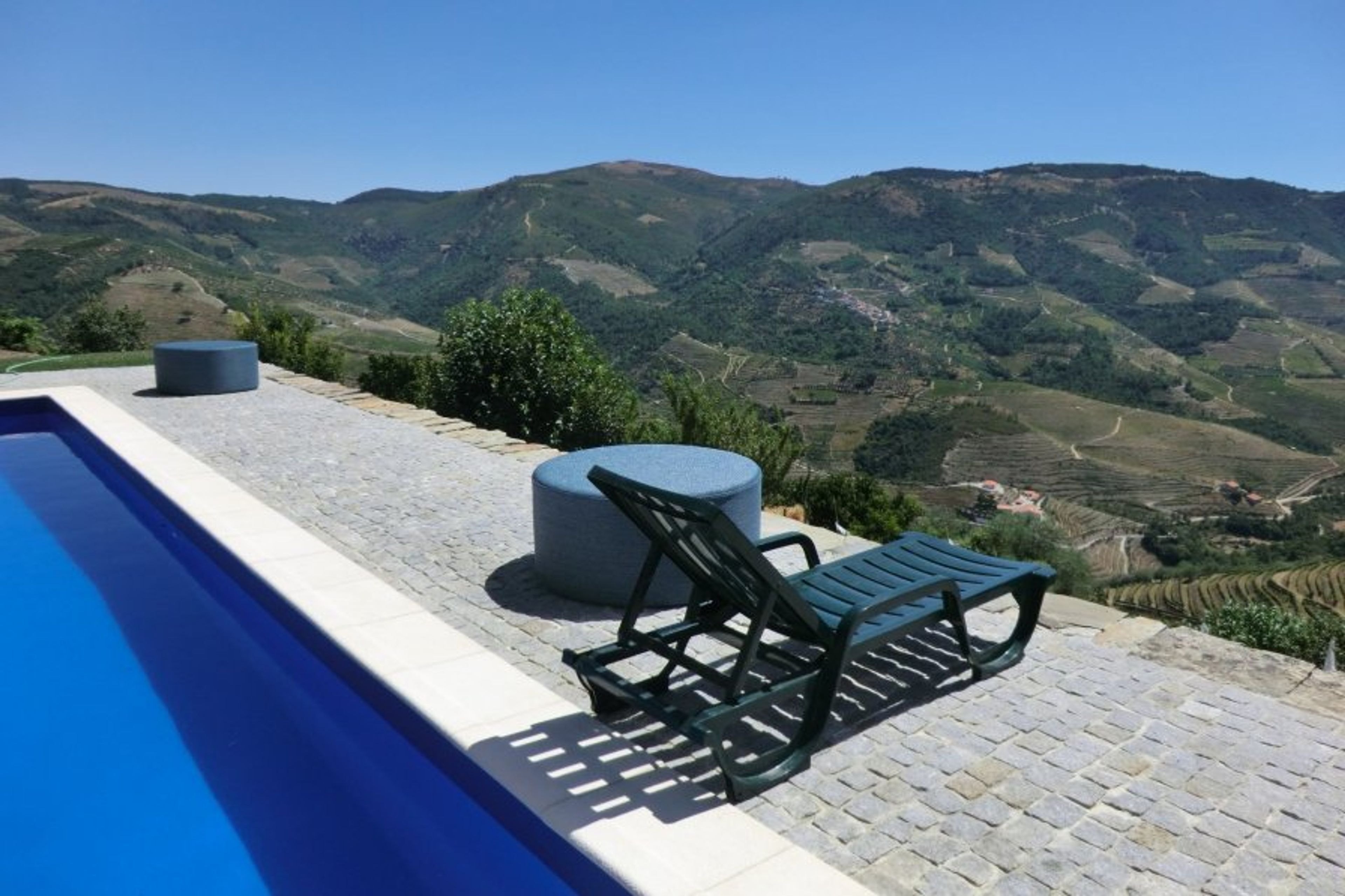 Have a chair and take in the view from Pool