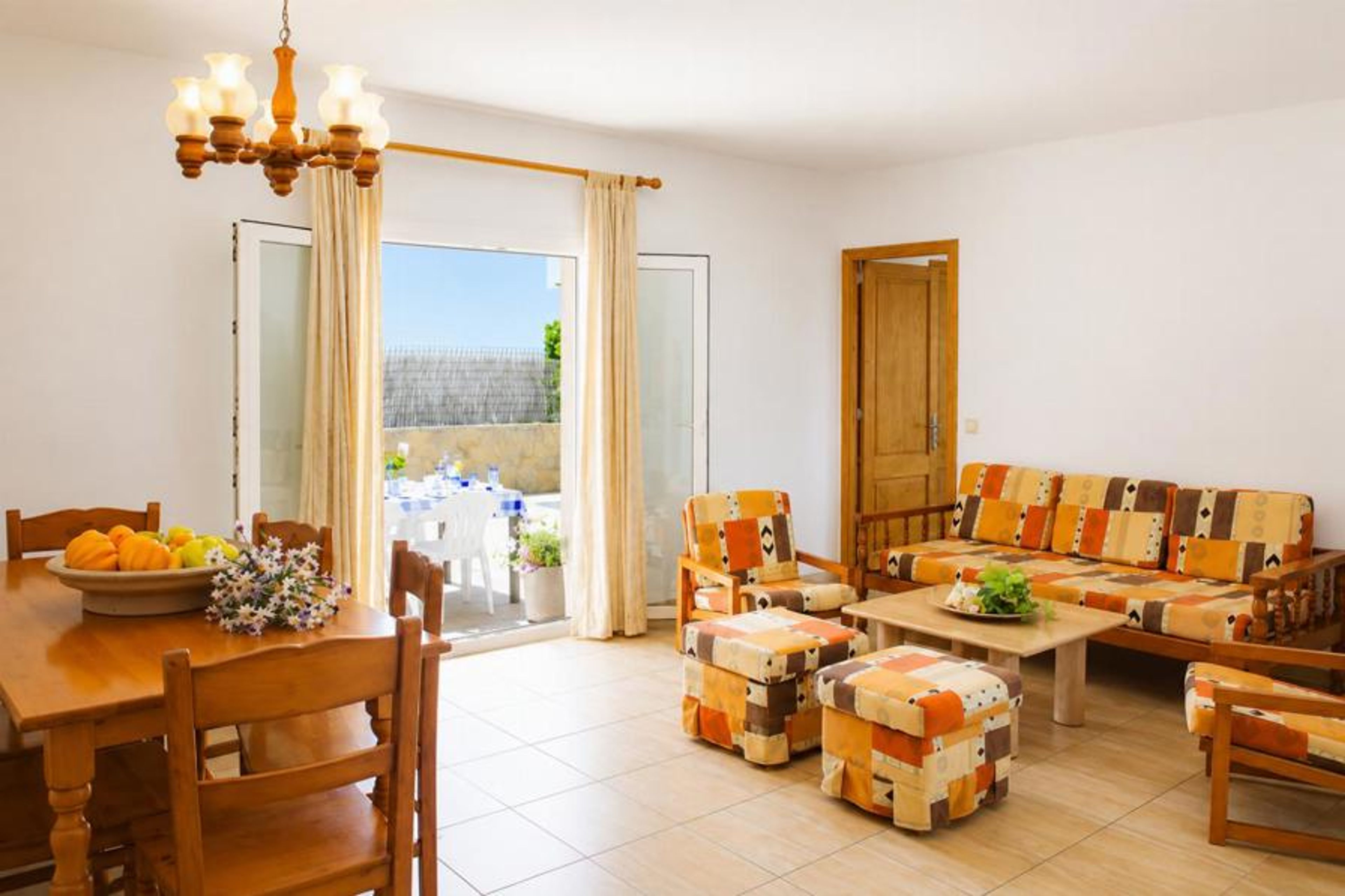 Living room with sofas, and dining area