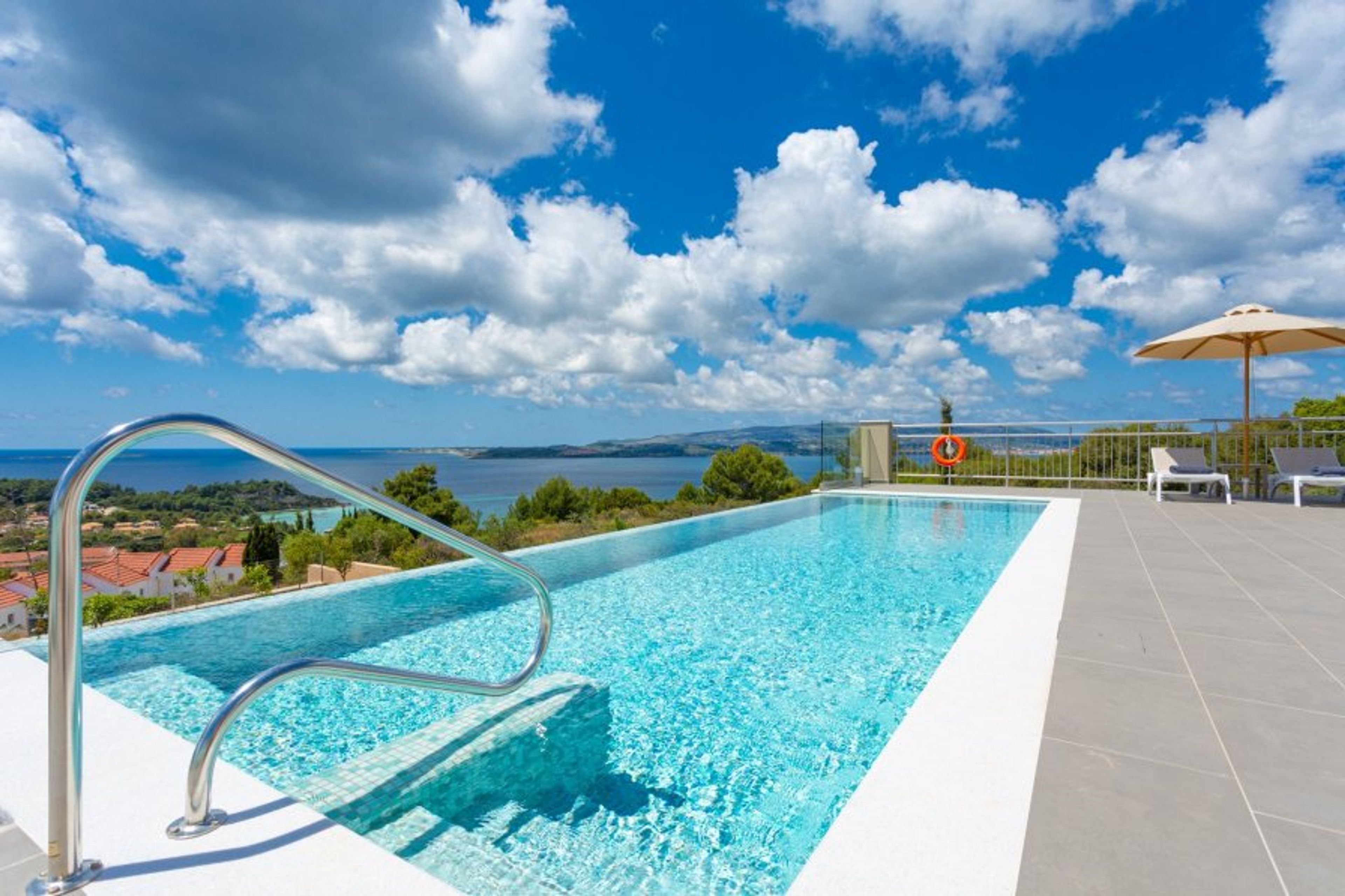 Private infinity pool and terrace with panoramic sea views