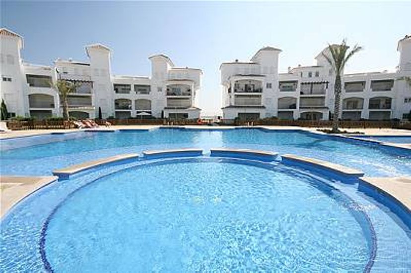 Apartment in La Torre Golf Resort, Spain: View Of The Apartment Across The Pool