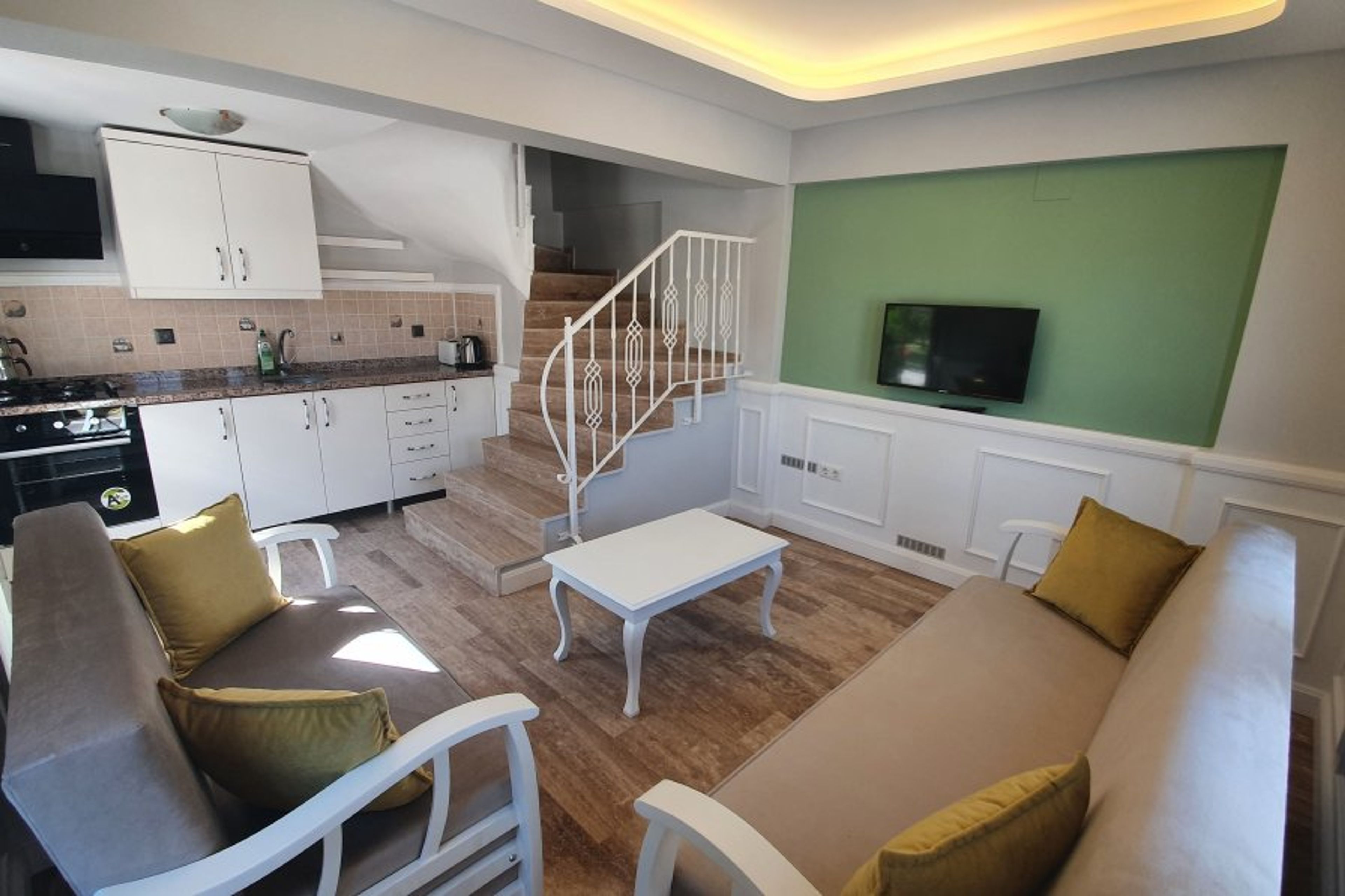 1 bedroomed apartments - open plan kitchen,living room in downstairs