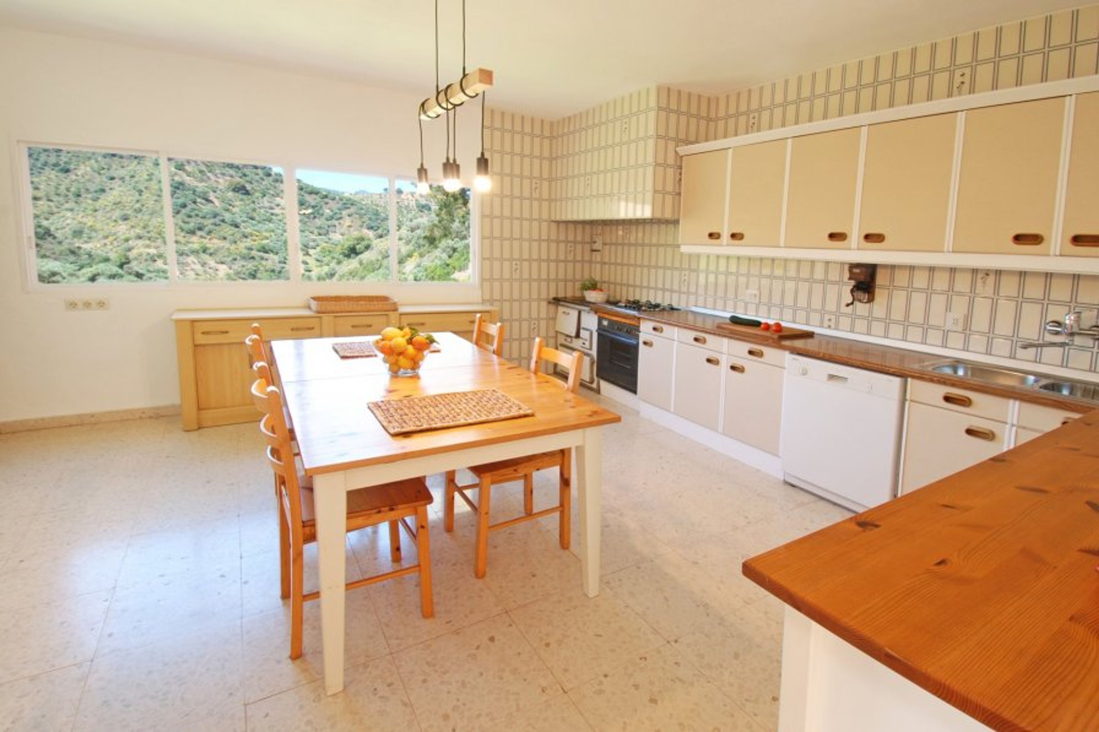The kitchen is spacious and well equipped. 