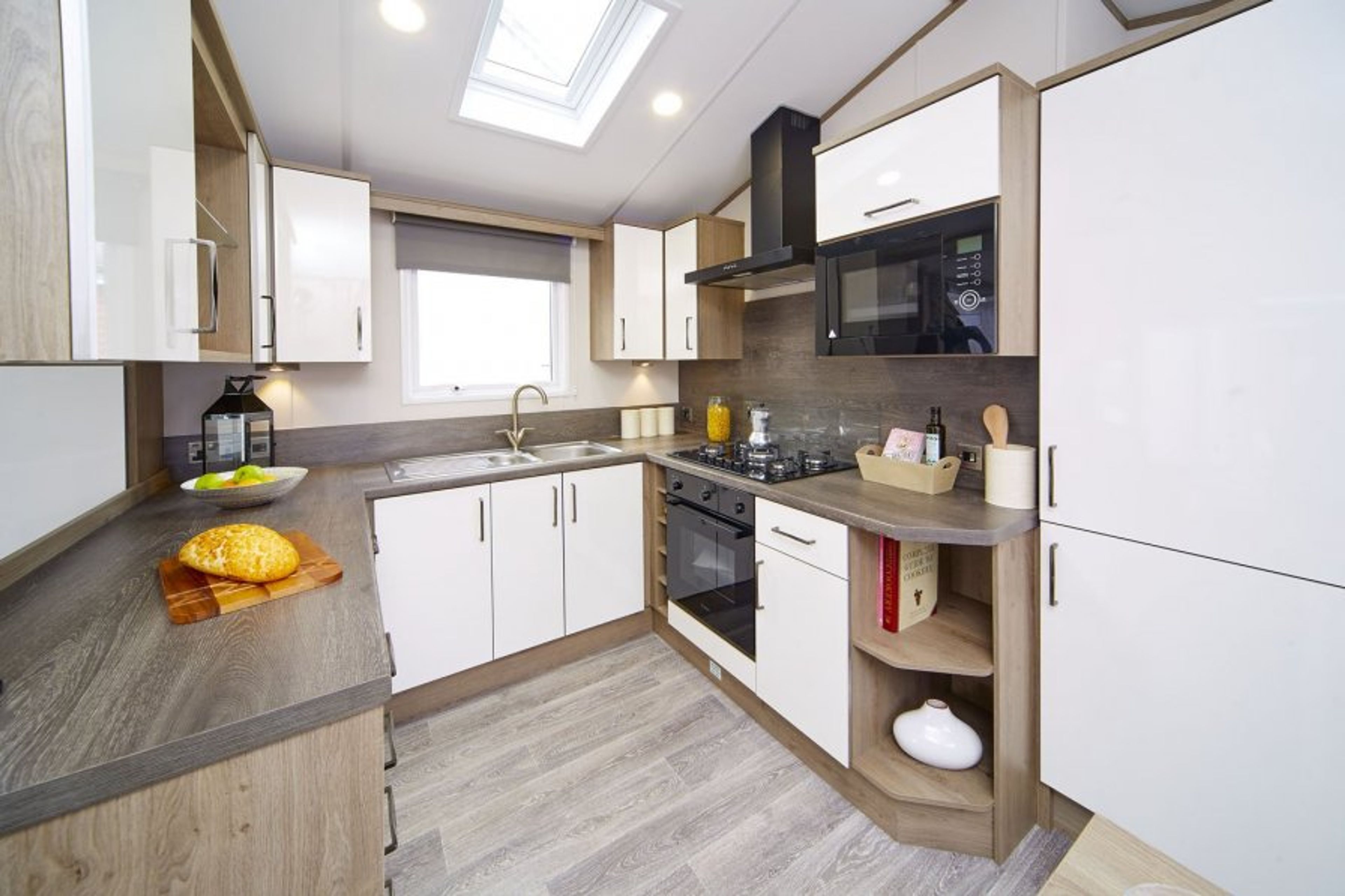 Fully equipped modern kitchen with dishwasher and fridge freezer