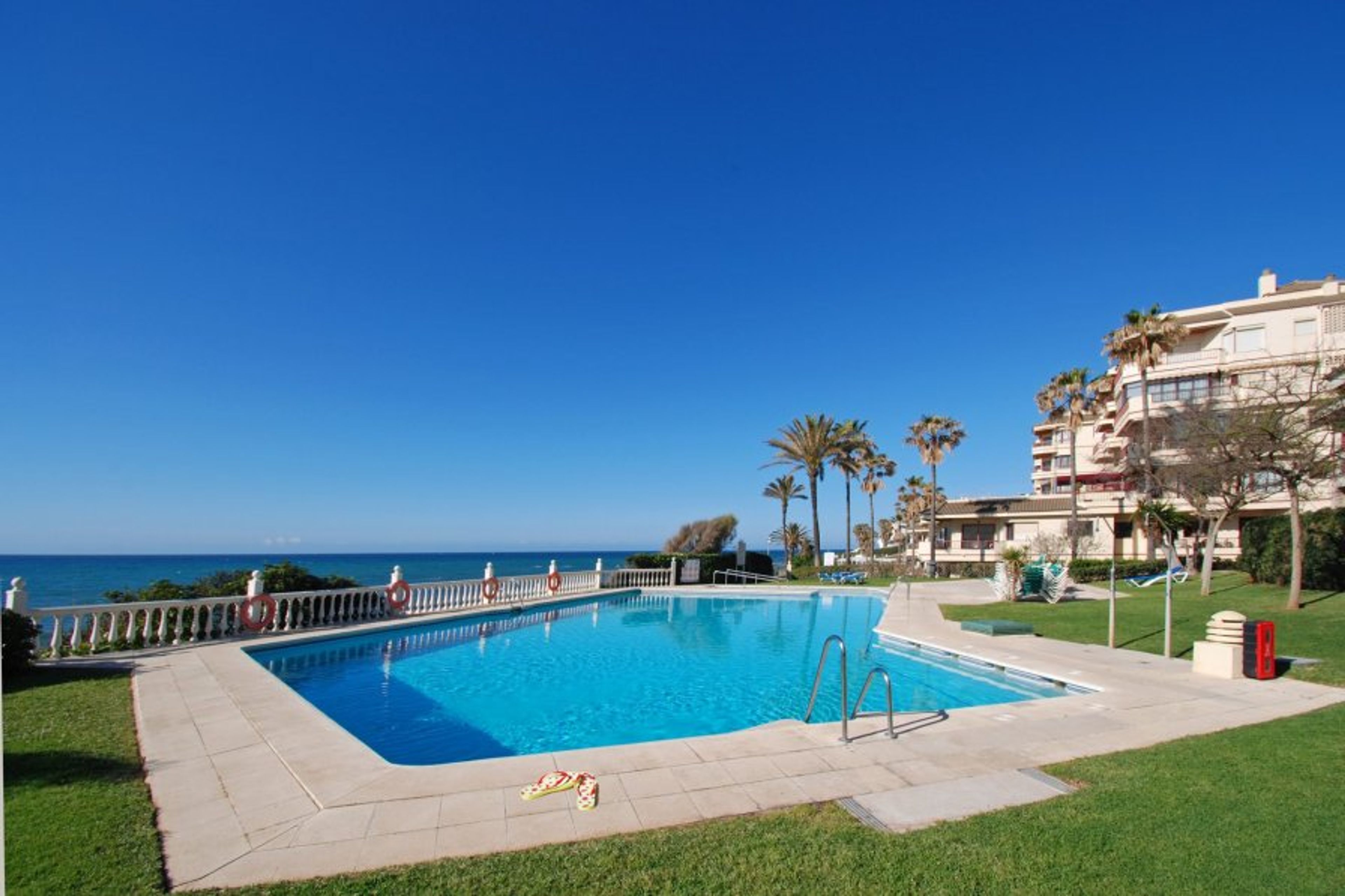 Beautiful communal pool that leads directly to the beach!