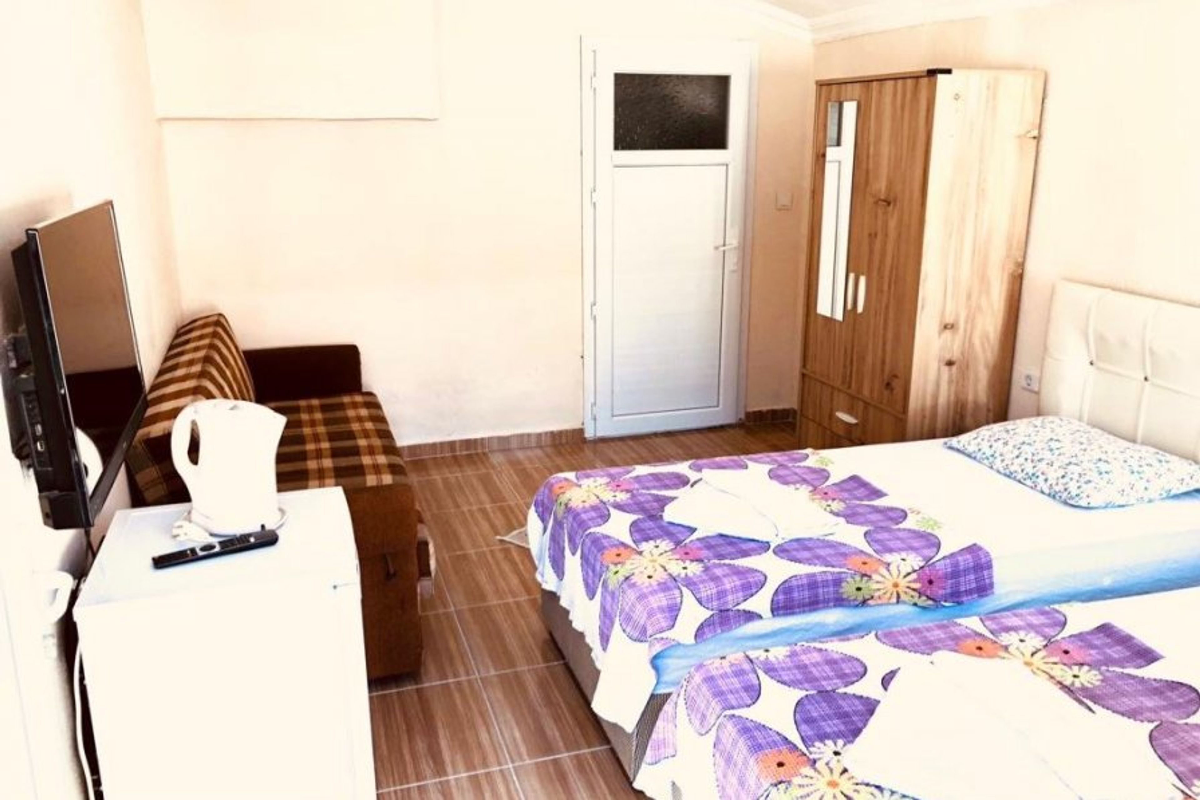 Two single beds and sofa bed(3 Aduld)