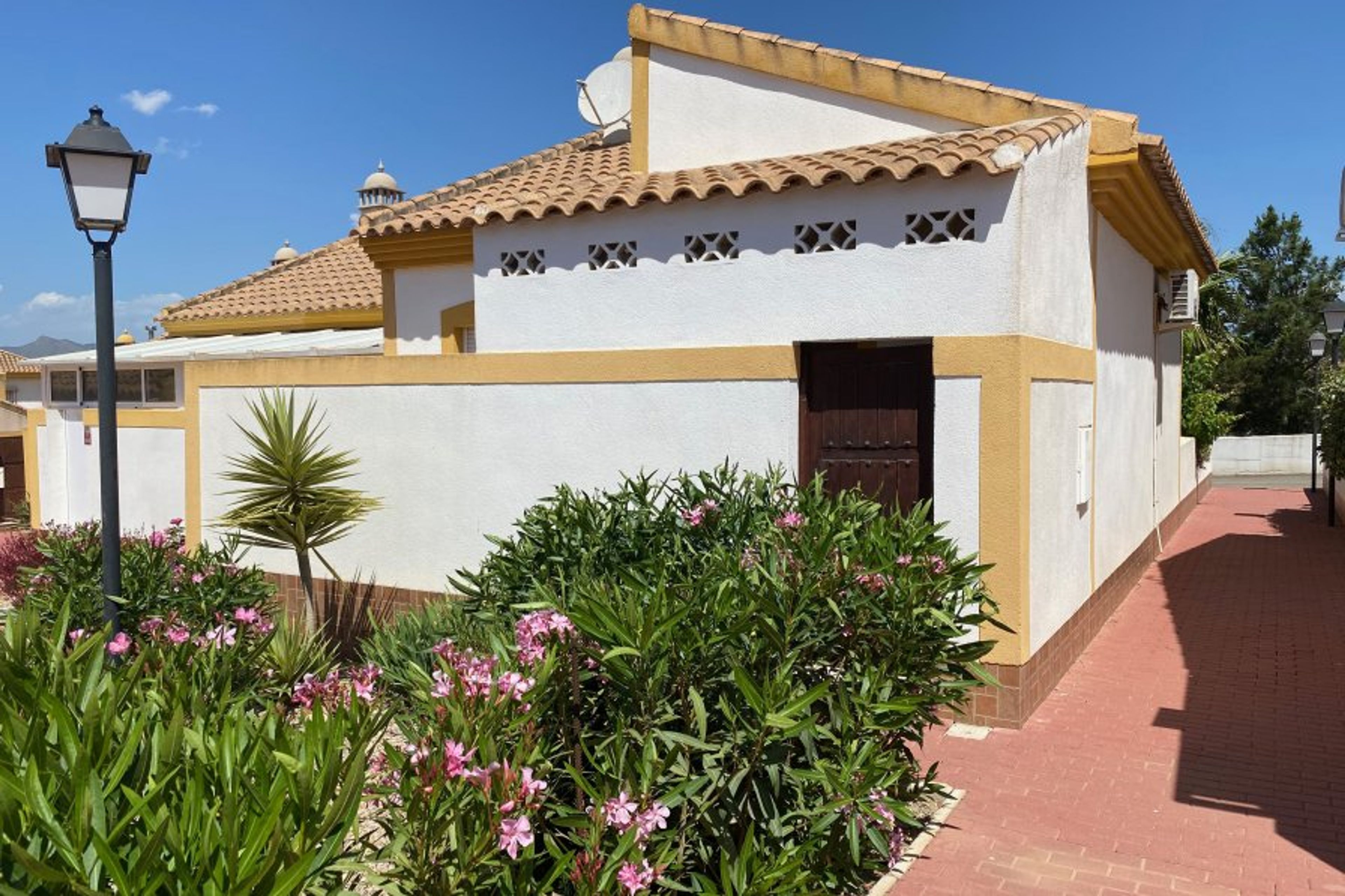 Back entrance 50% covered located at great Mediterranean park.