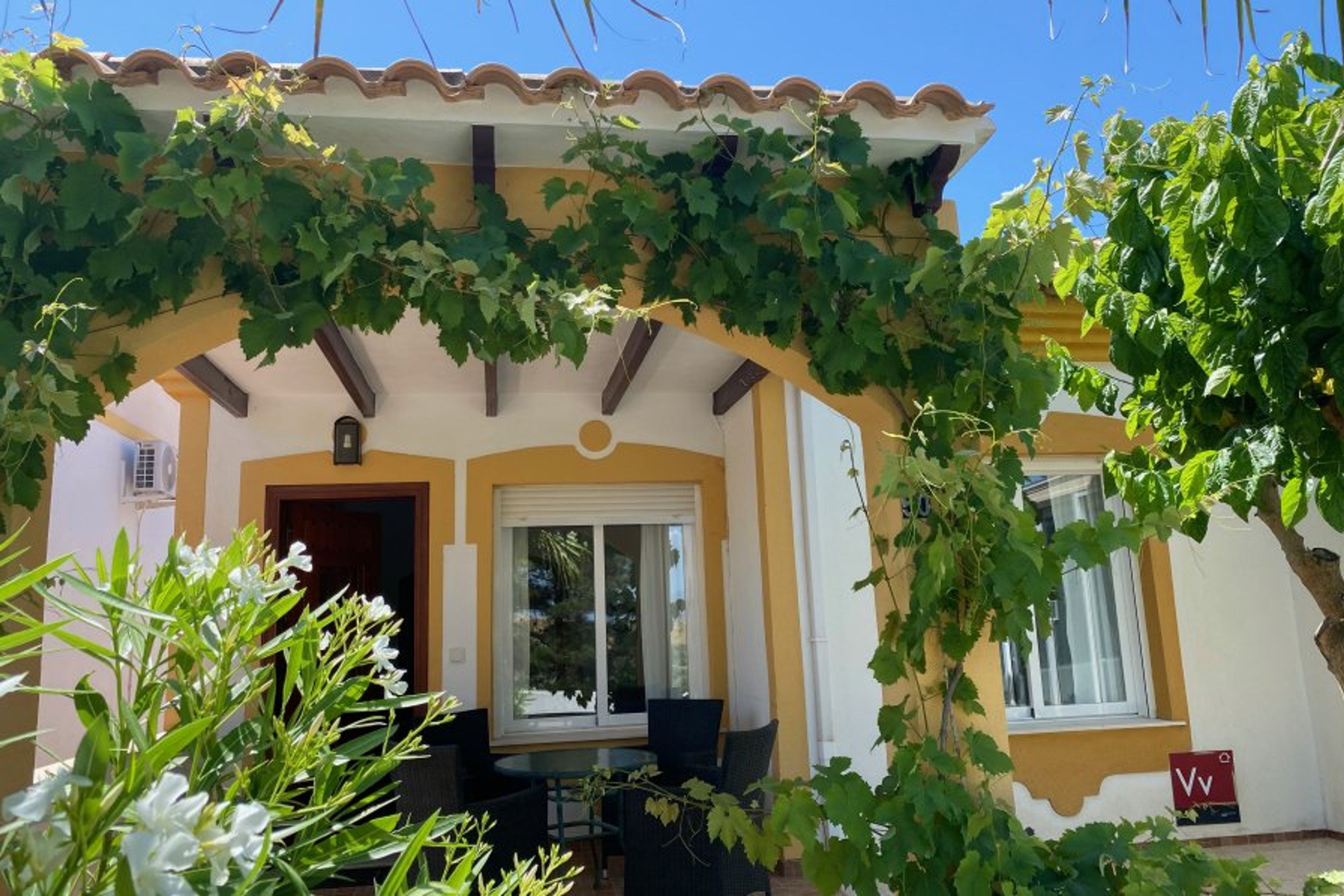 Front terrace with porche and sunny terrace.Also private parking.