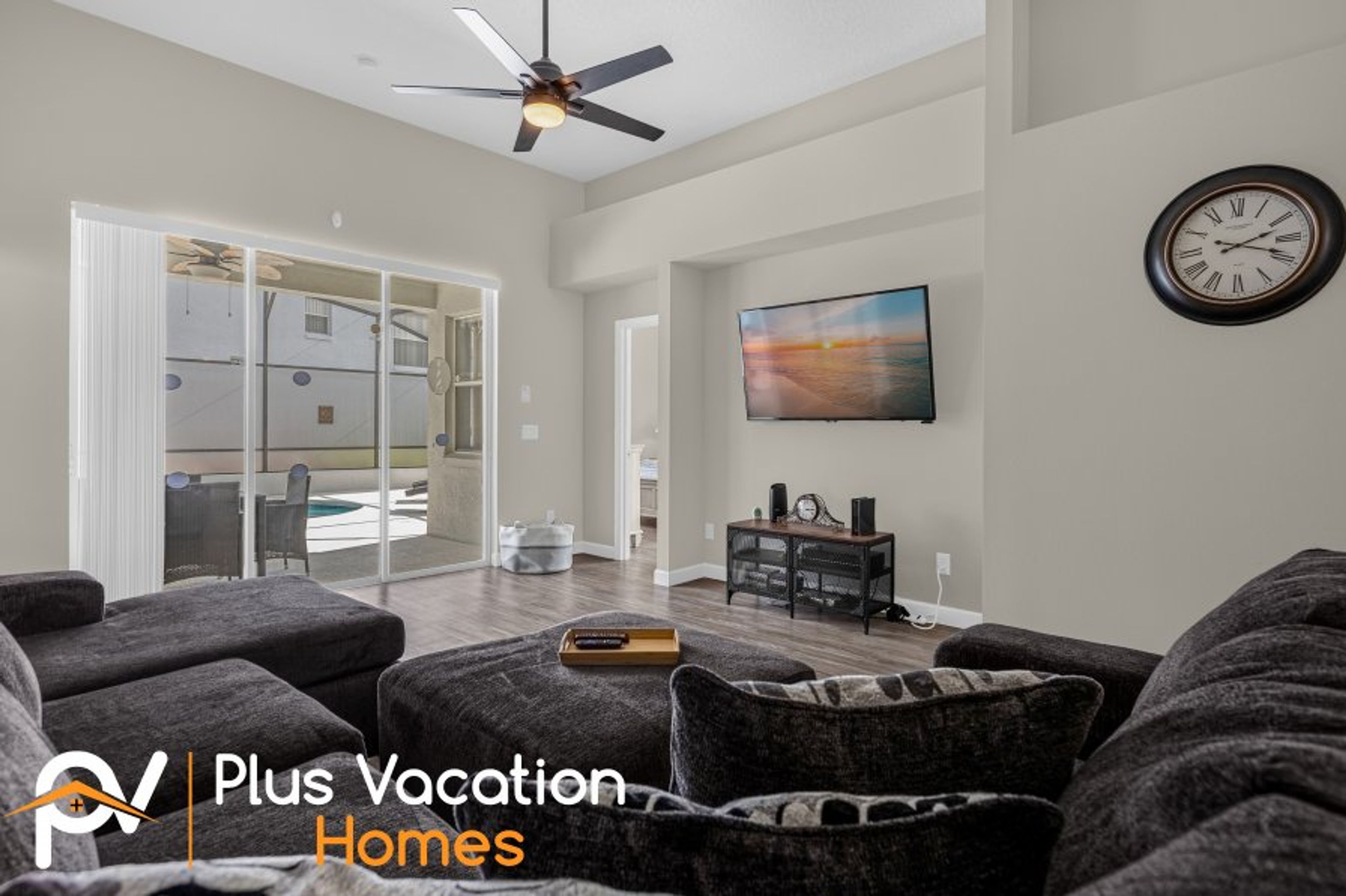 Living room with pool view 