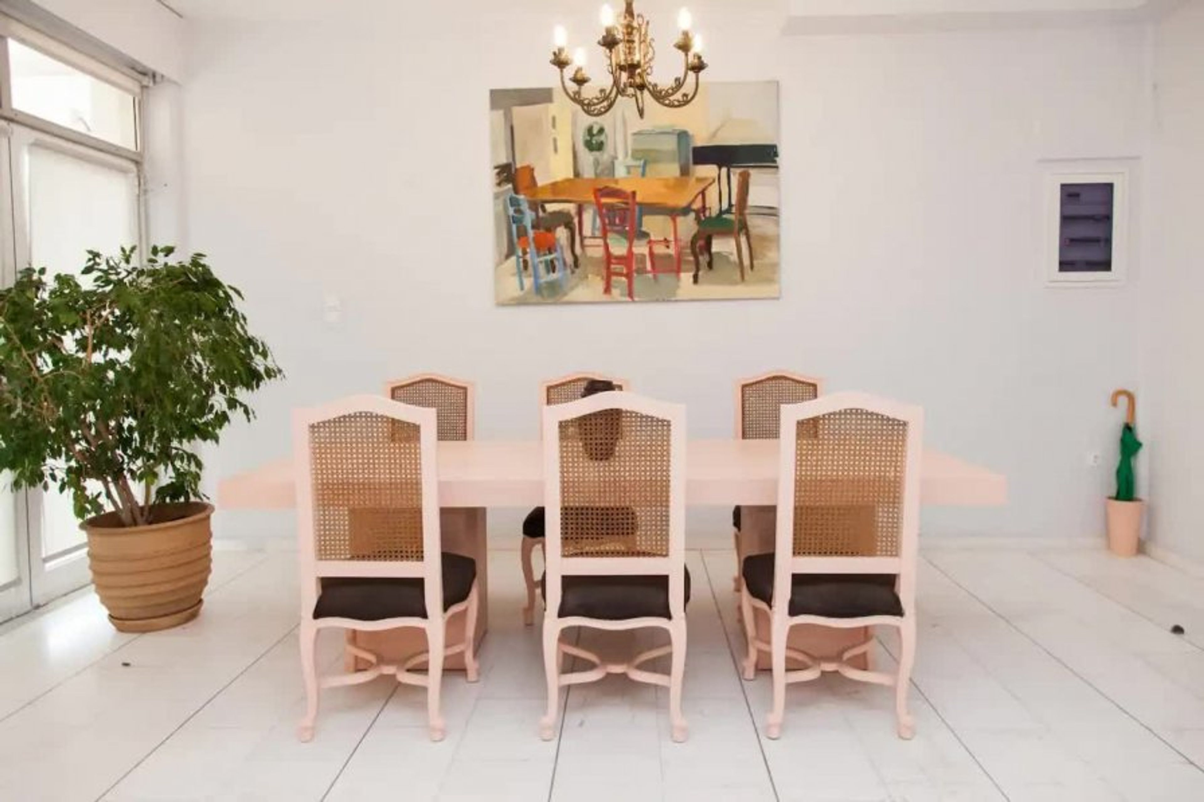 Large dining table seats 8 people with instagammable greek painting 
