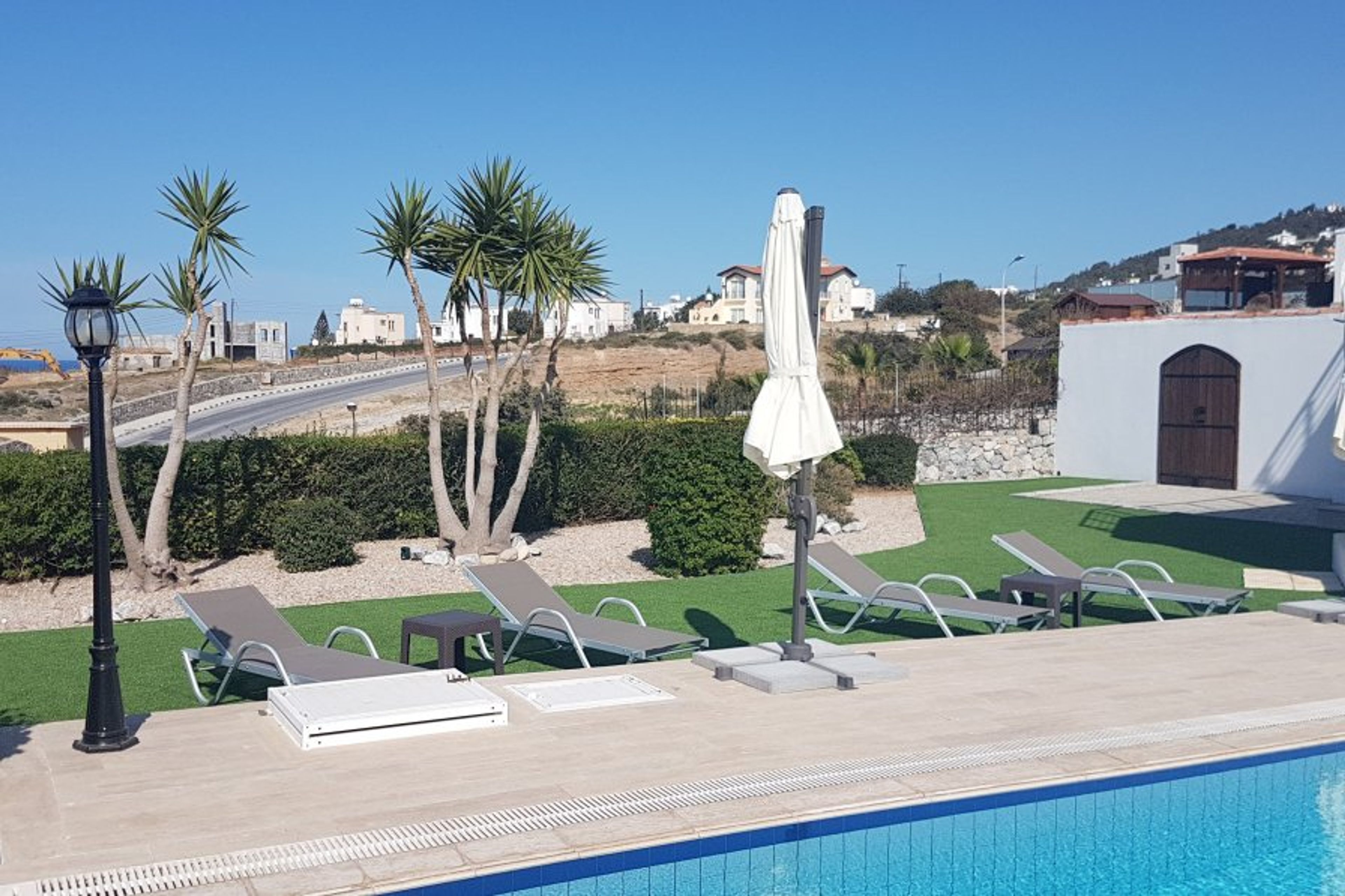 Grass & sun loungers