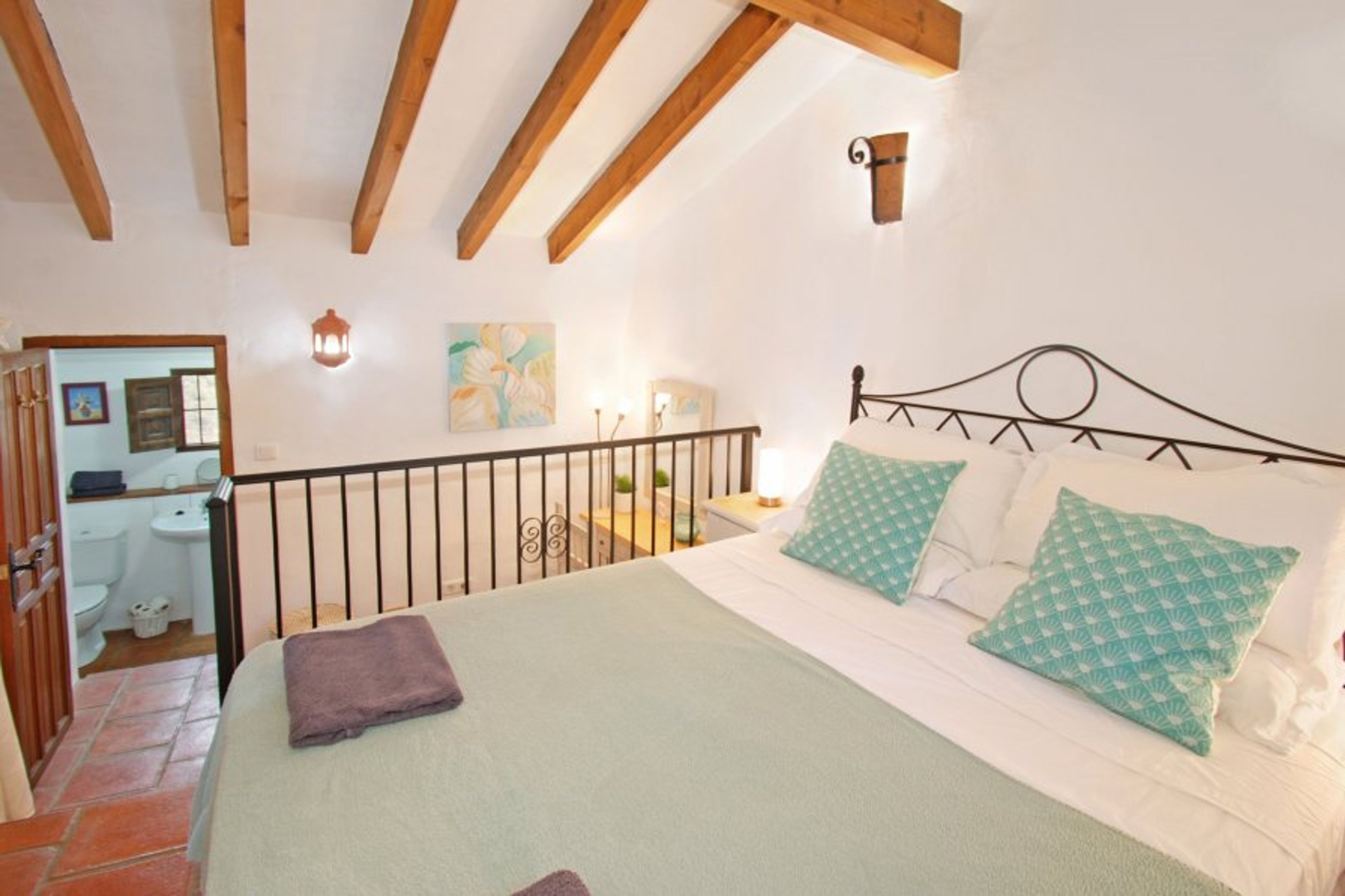 Experience ultimate relaxation with a comfortable bed.