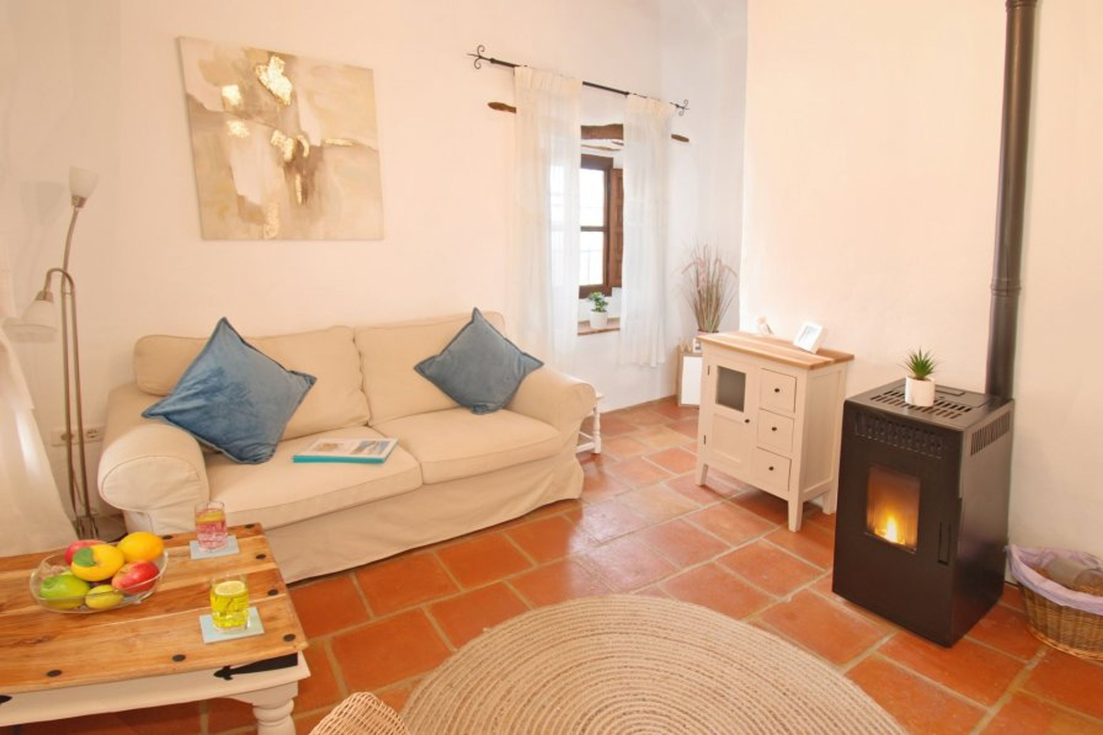 In a comfy lounge, a pellet stove adds warmth and coziness on chilly e