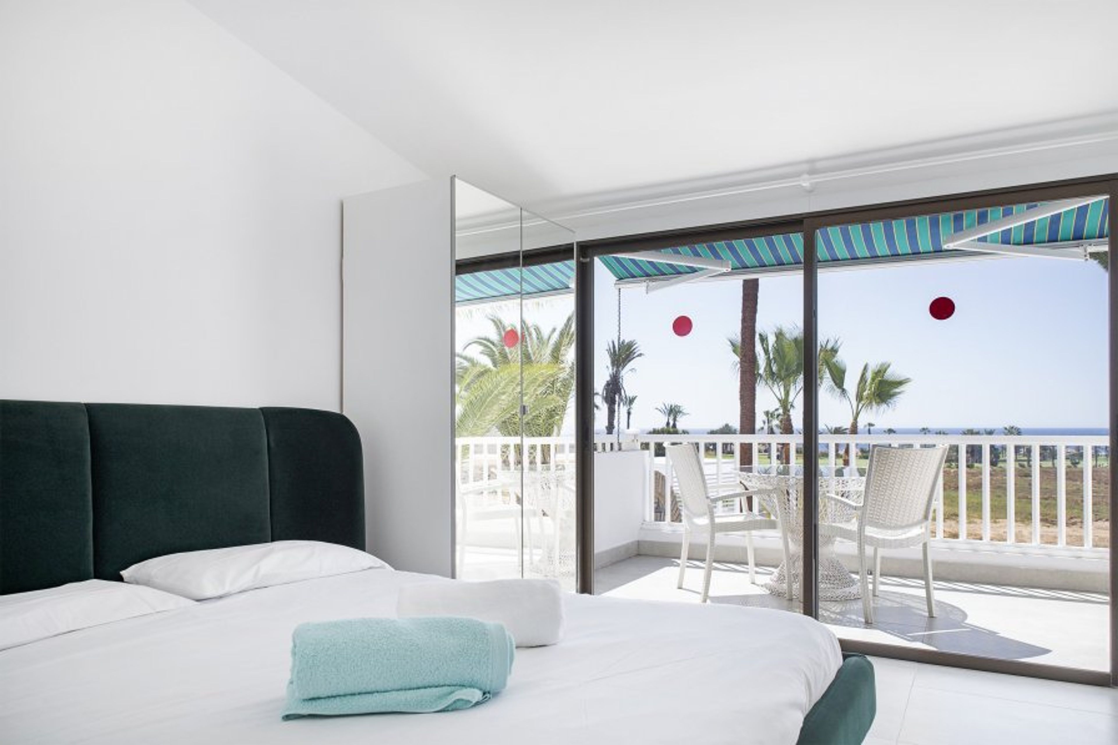 Bedroom to balcony with lovely sea views