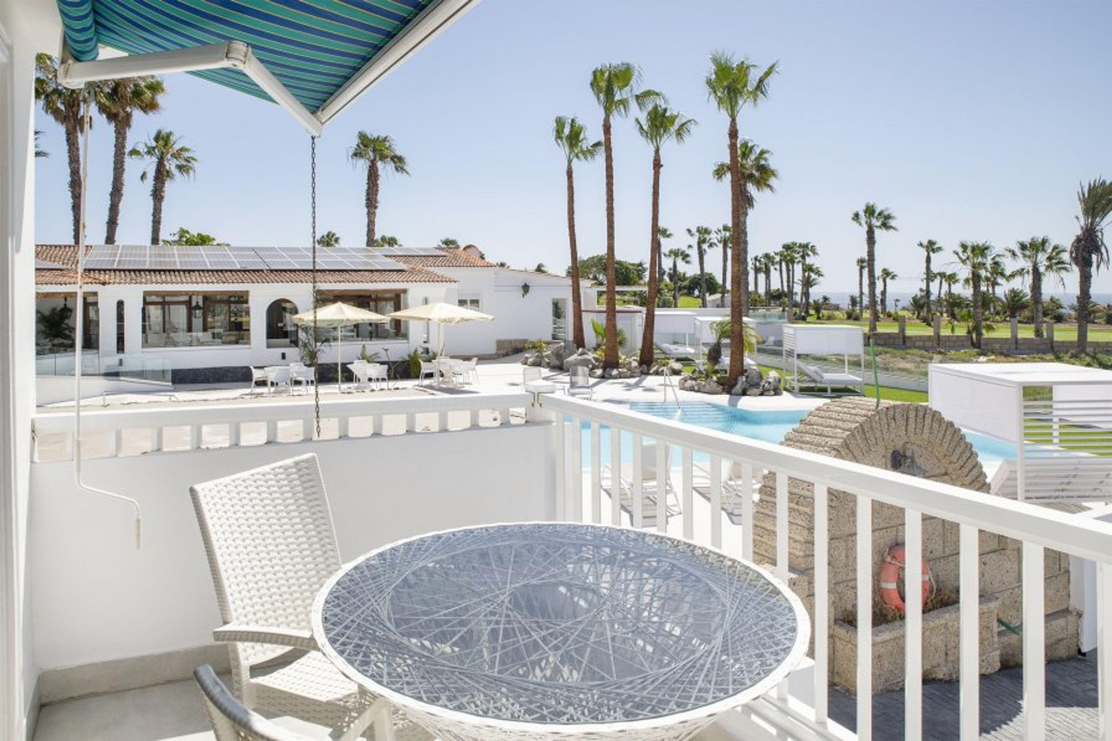 Balcony with lovely sea, golf course and swimming pool views