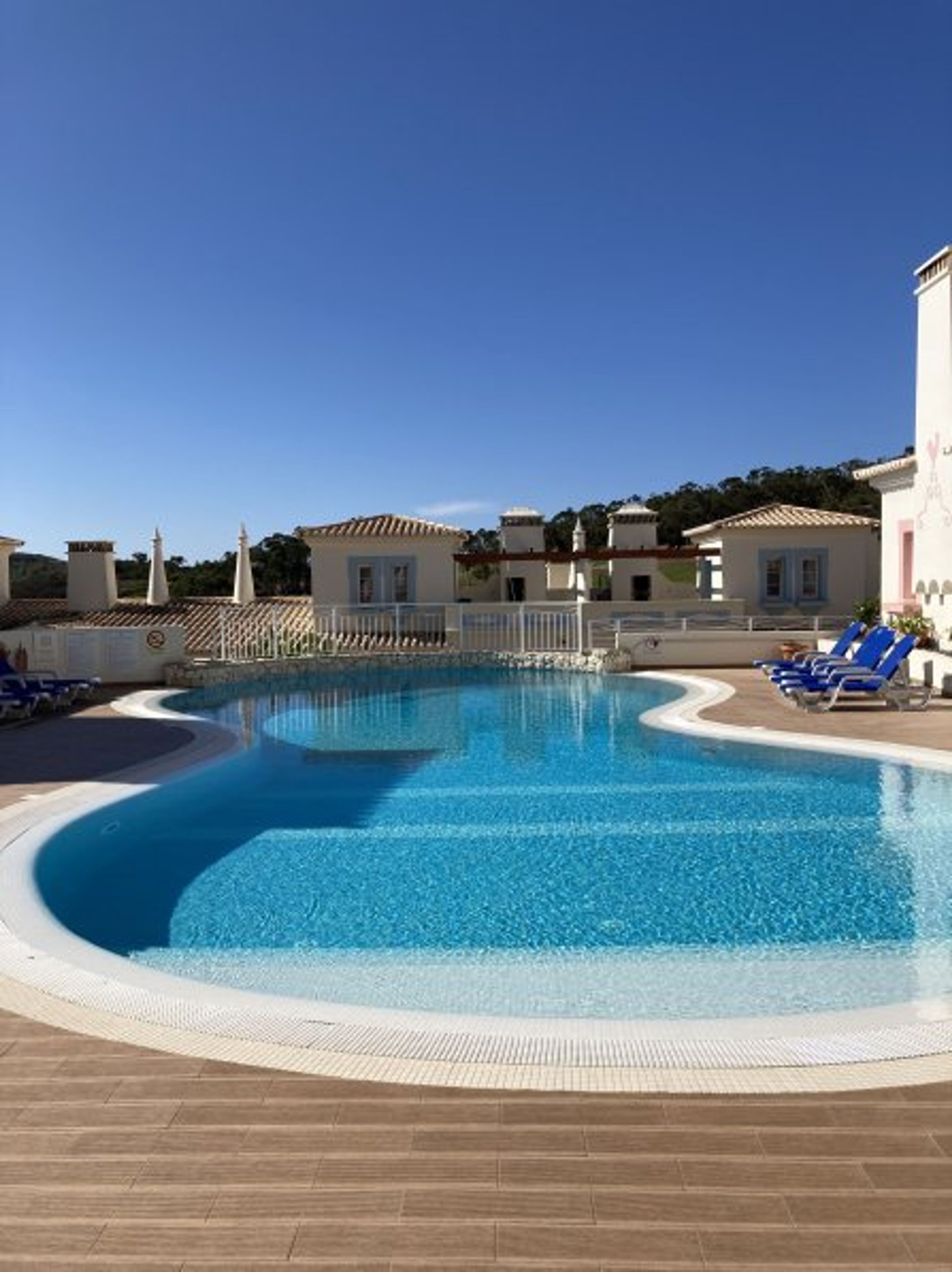 Heated and free unlike some. No roads to cross as poolside property