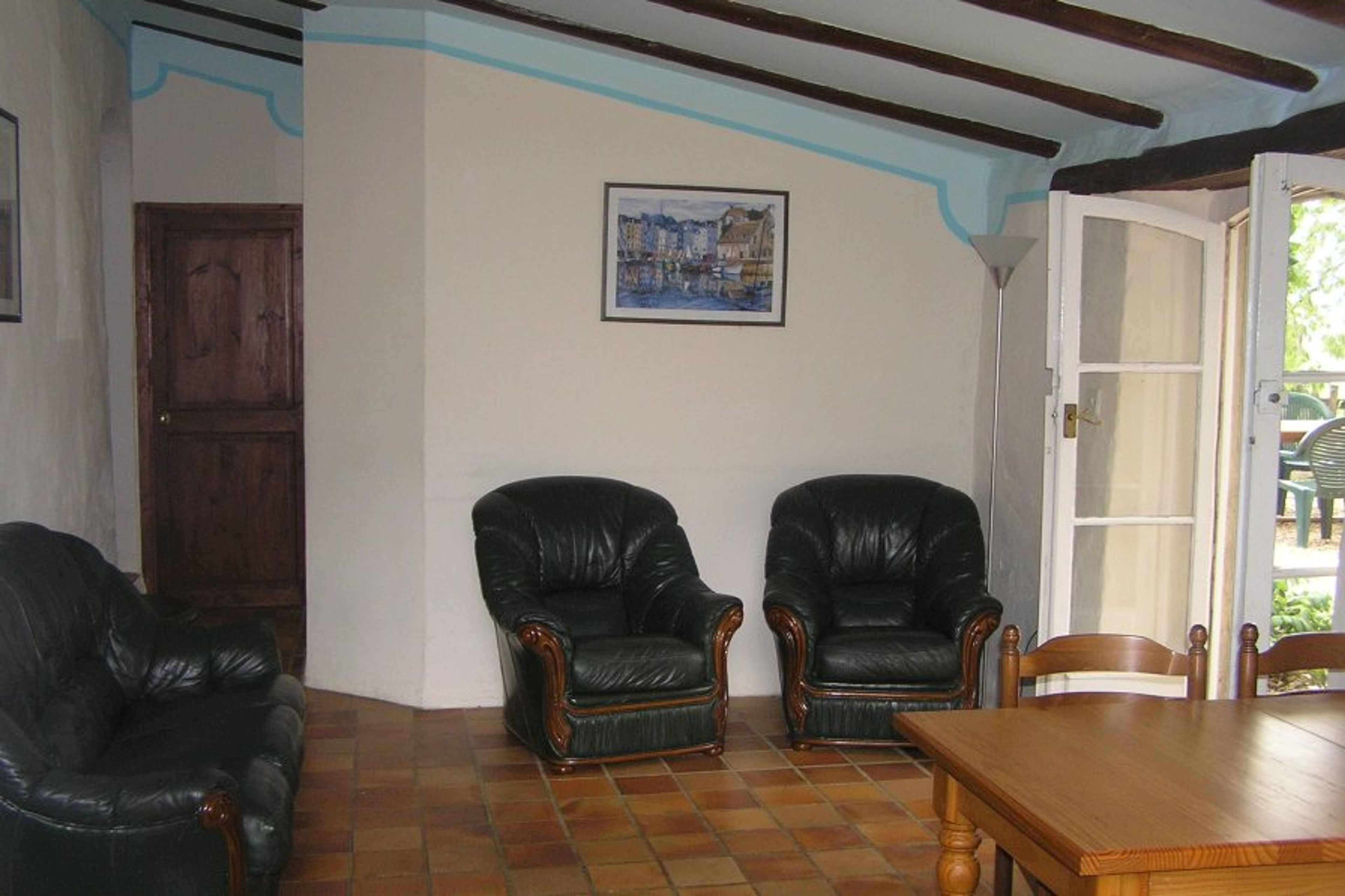 The lounge opens directly to your private garden set for th outdoors  