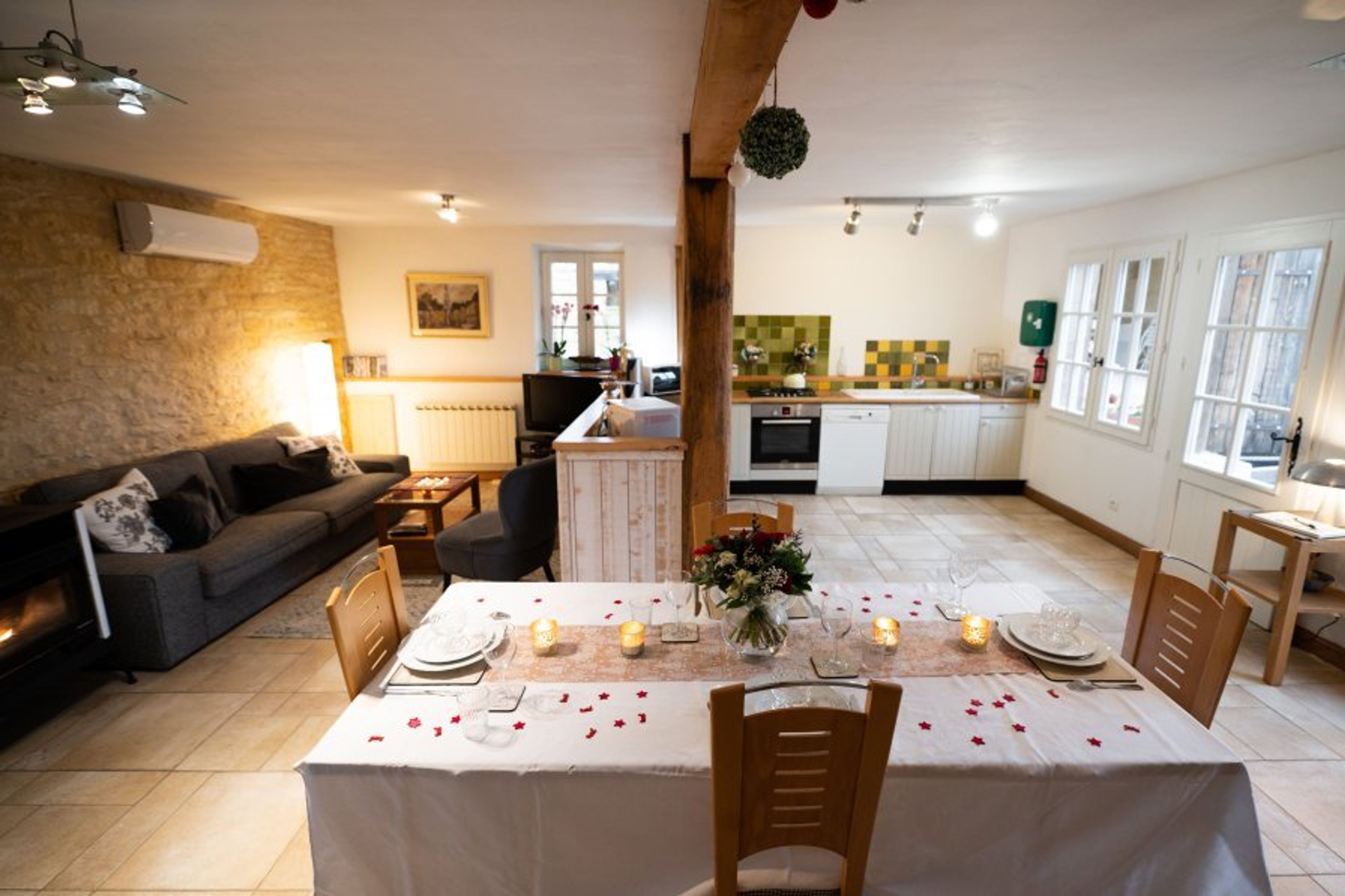 The light, modern/rustic open-plan living and dining area.