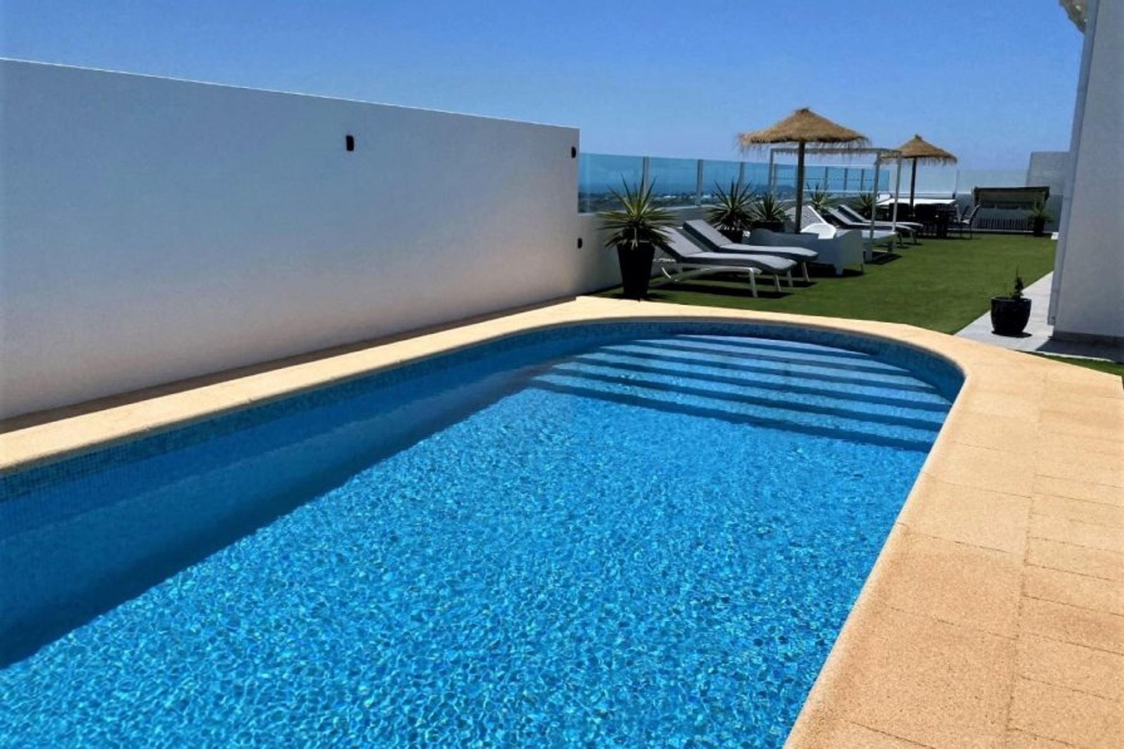 Pool heated to a min 28 degree's + sea views + free air con
