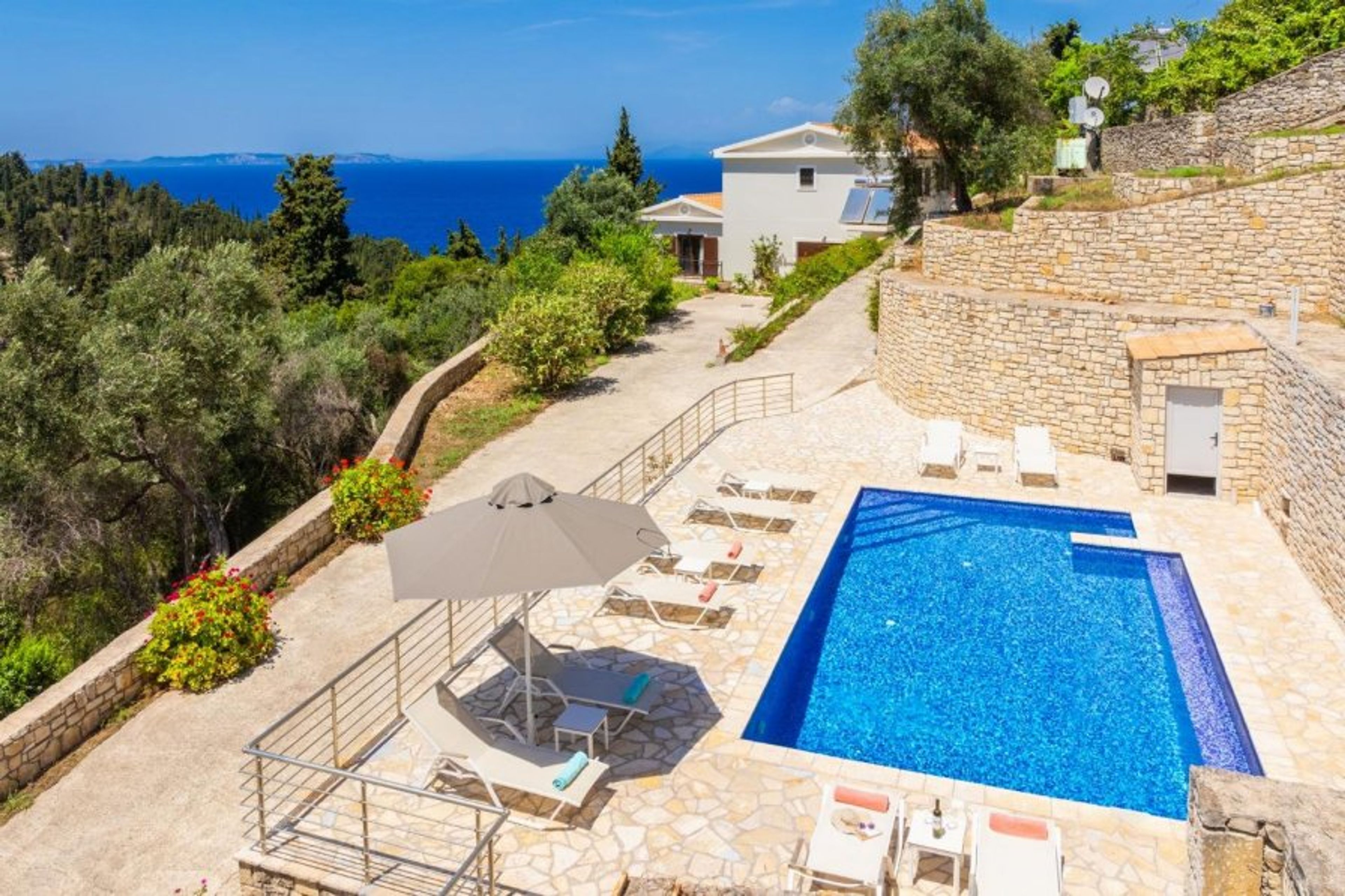 Beautiful villa with private pool, terraces, and garden with panoramic sea views