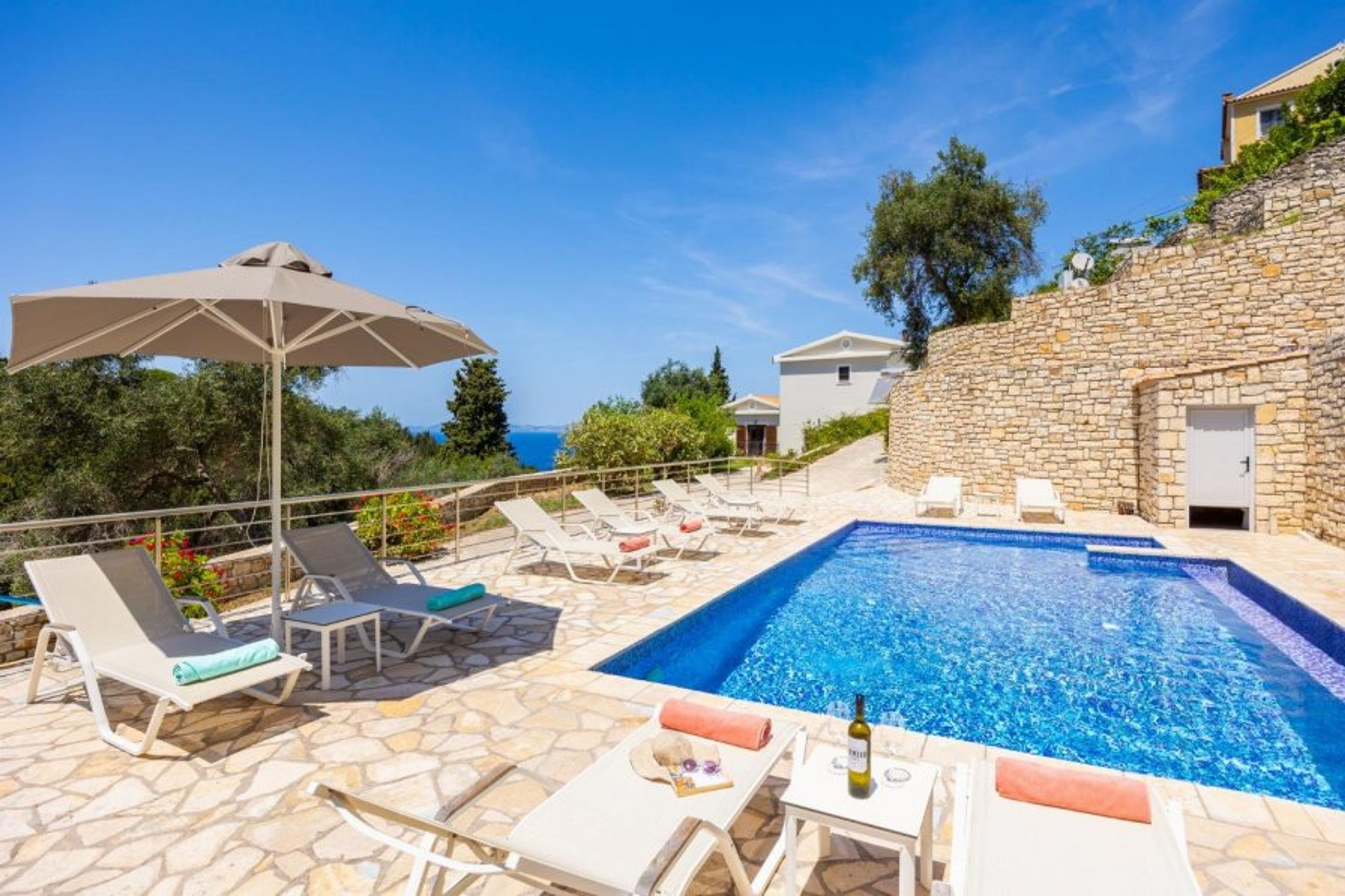 Beautiful villa with private pool, terraces, and garden with panoramic sea views