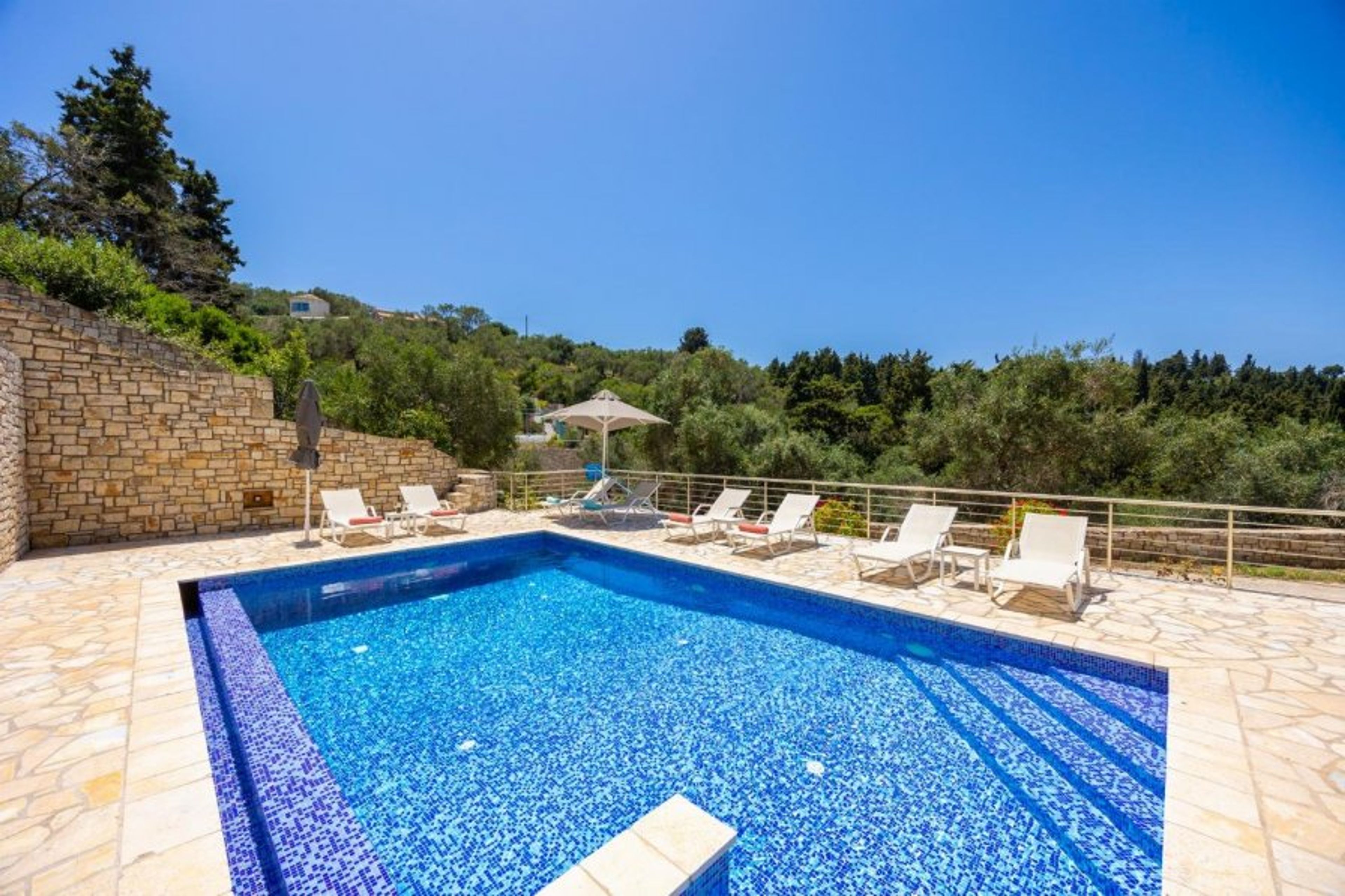 Private pool, terraces, and garden with panoramic sea views