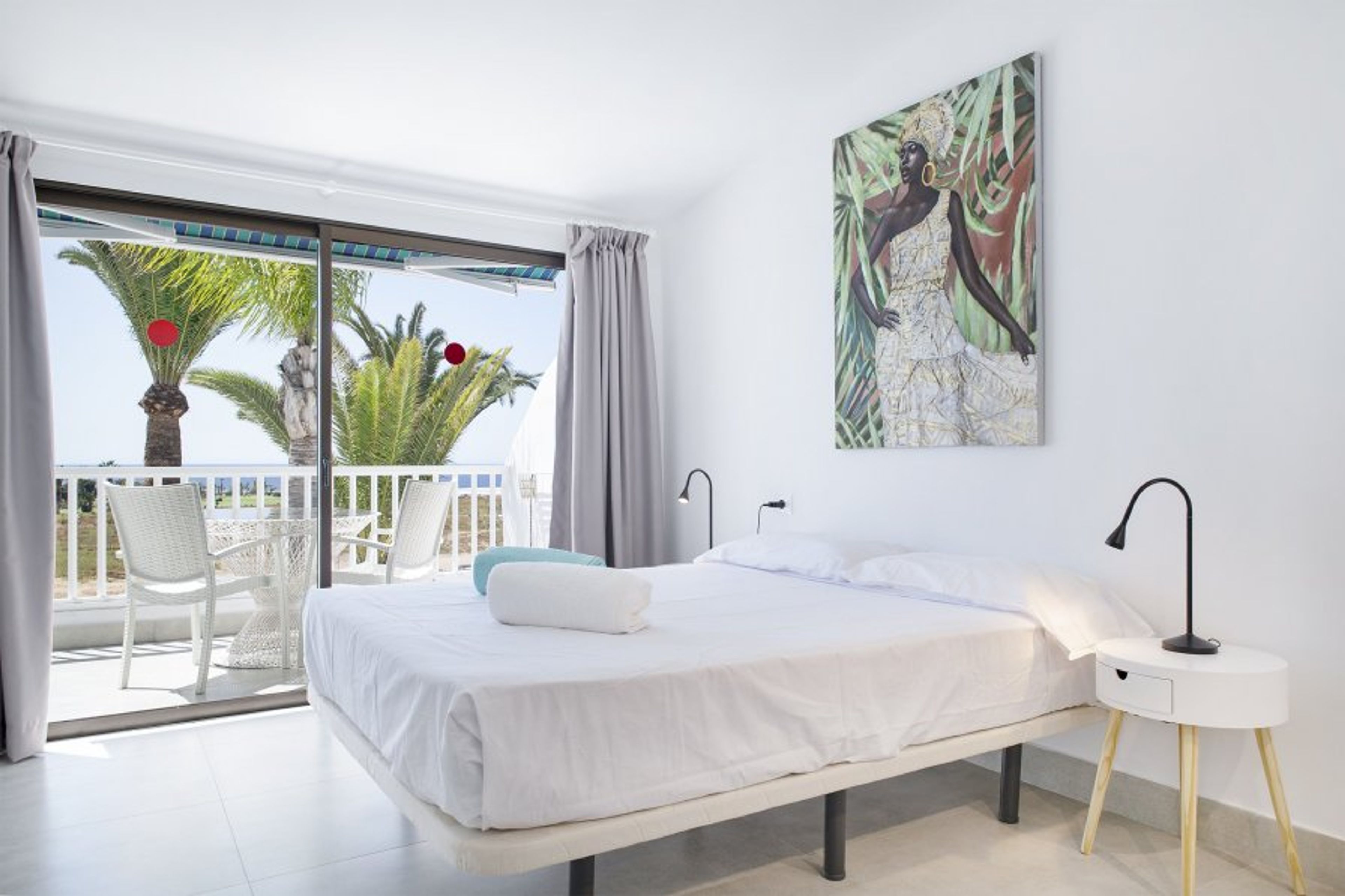 Bedroom to balcony with lovely sea views