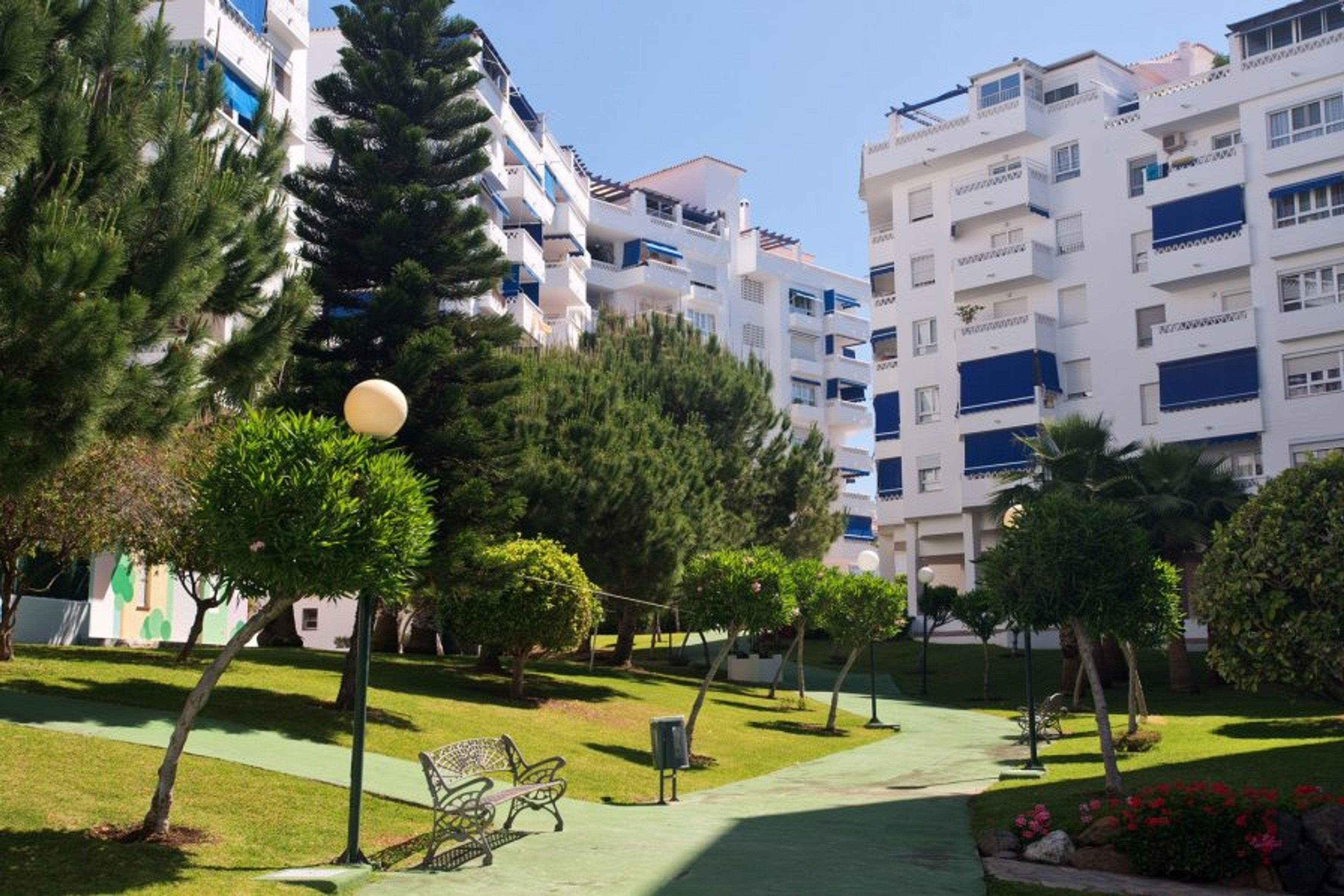 Shared gardens by the swimming pool.