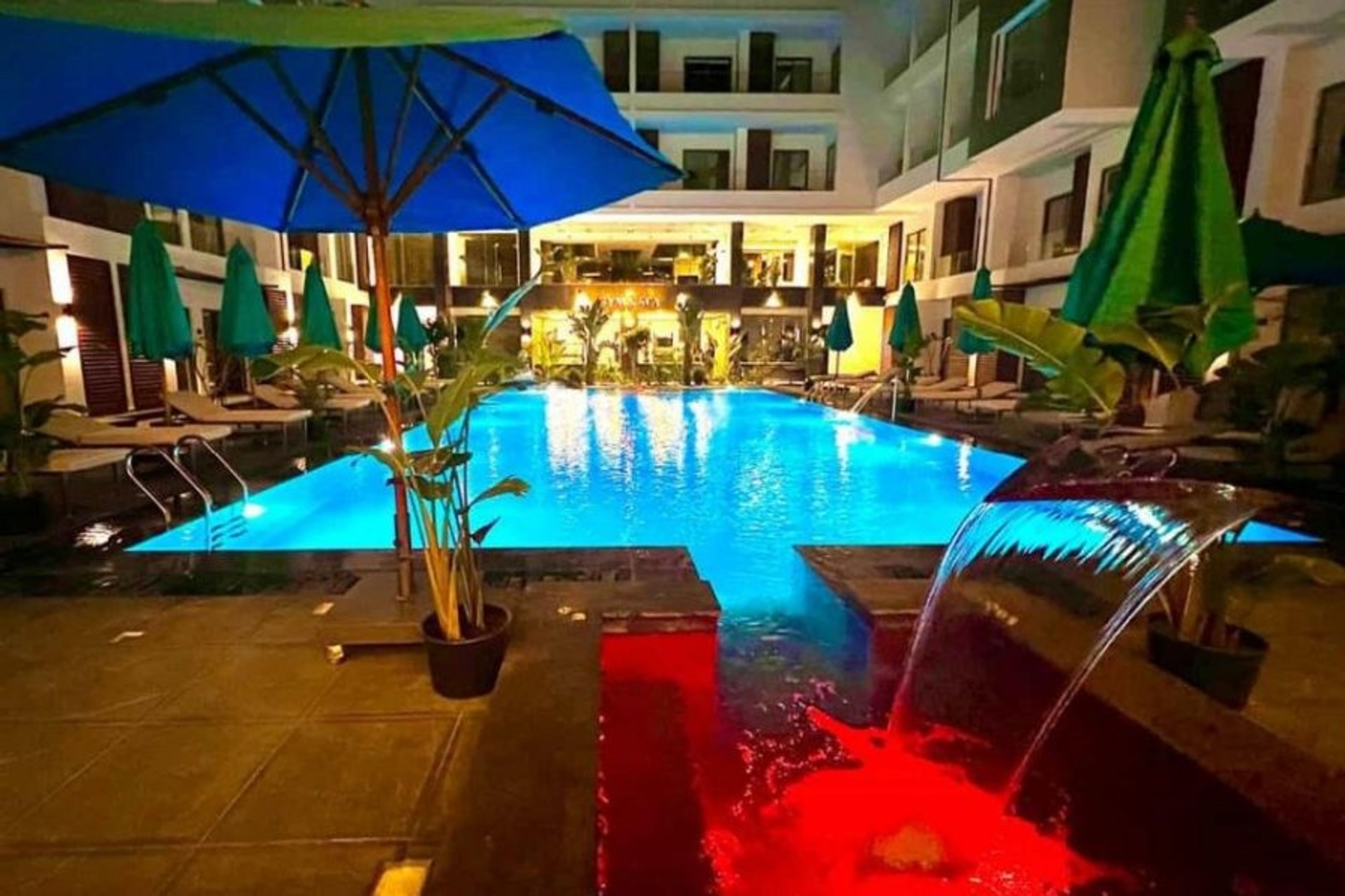 Main pool and jacuzzi at night