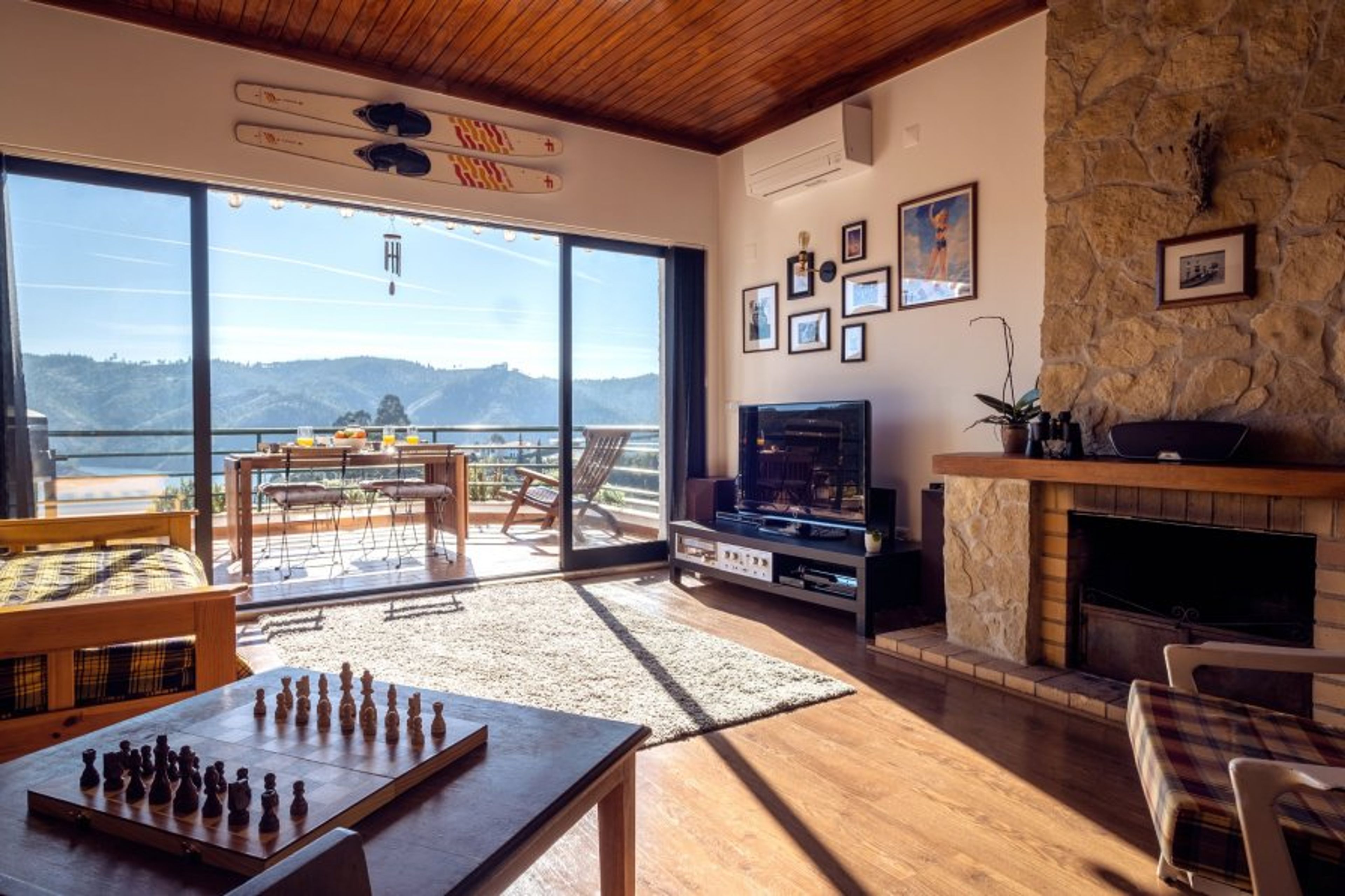 Sun-drenched living room with ample space to relax and unwind.