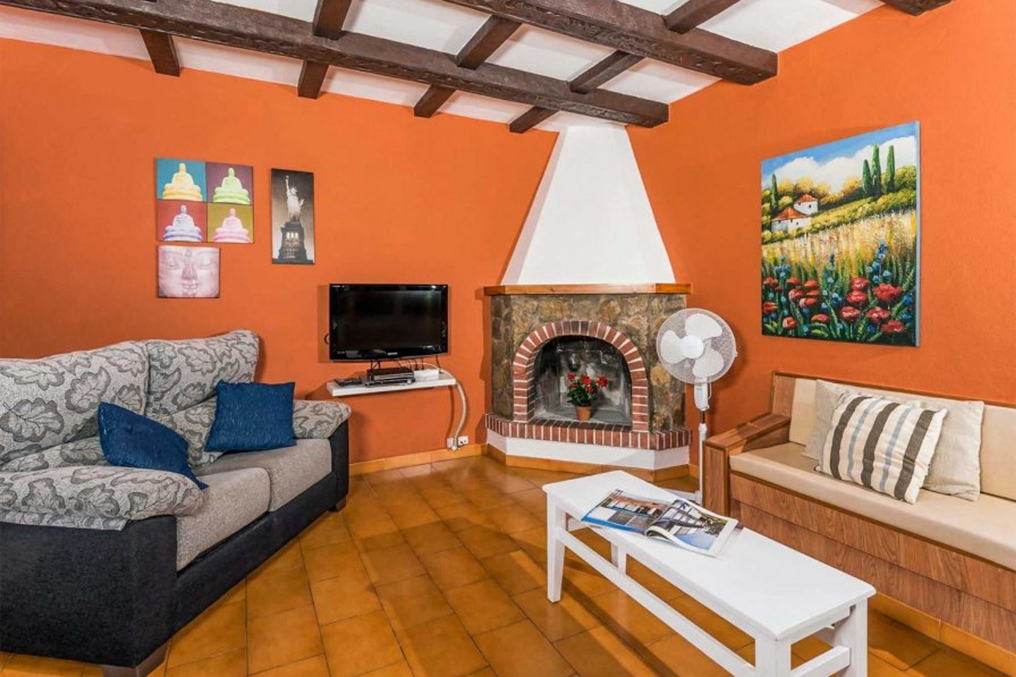 Open plan living room with WiFi Internet, Satellite TV, and Ornamental Fireplace