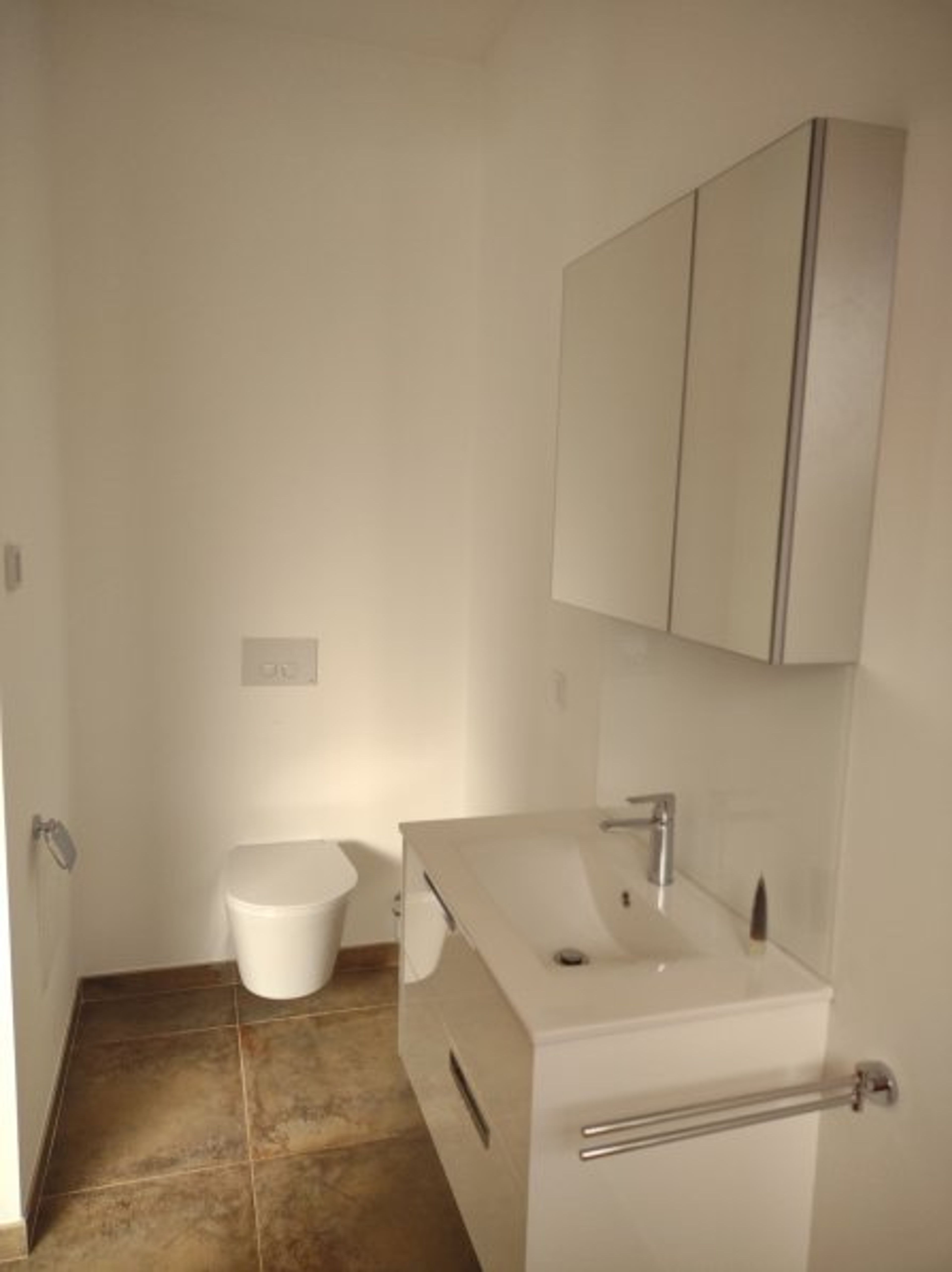 Toilet, soap, shampoo. complete bathroom.