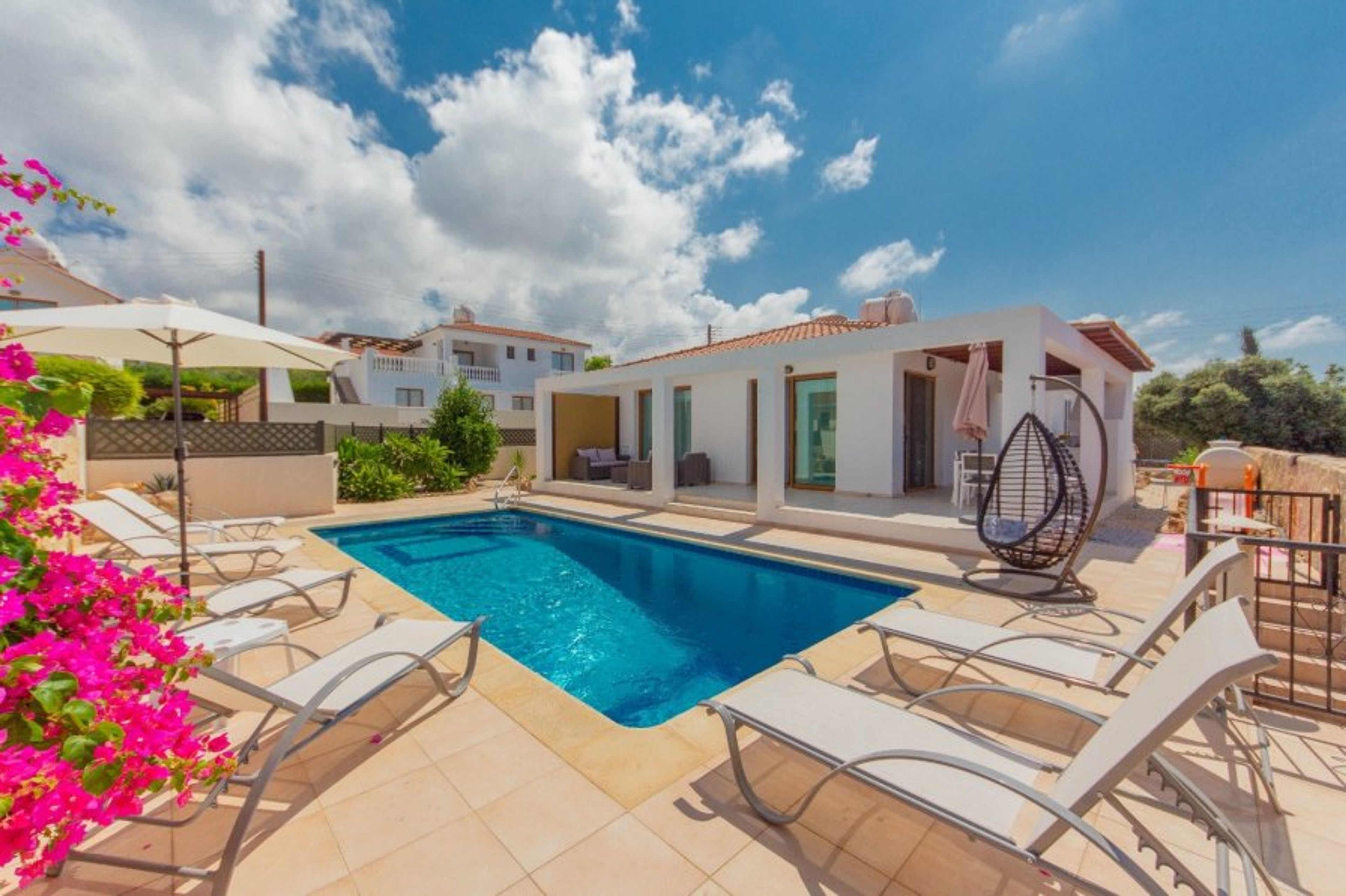 Villa Helena with private poolside, sea and hill views.