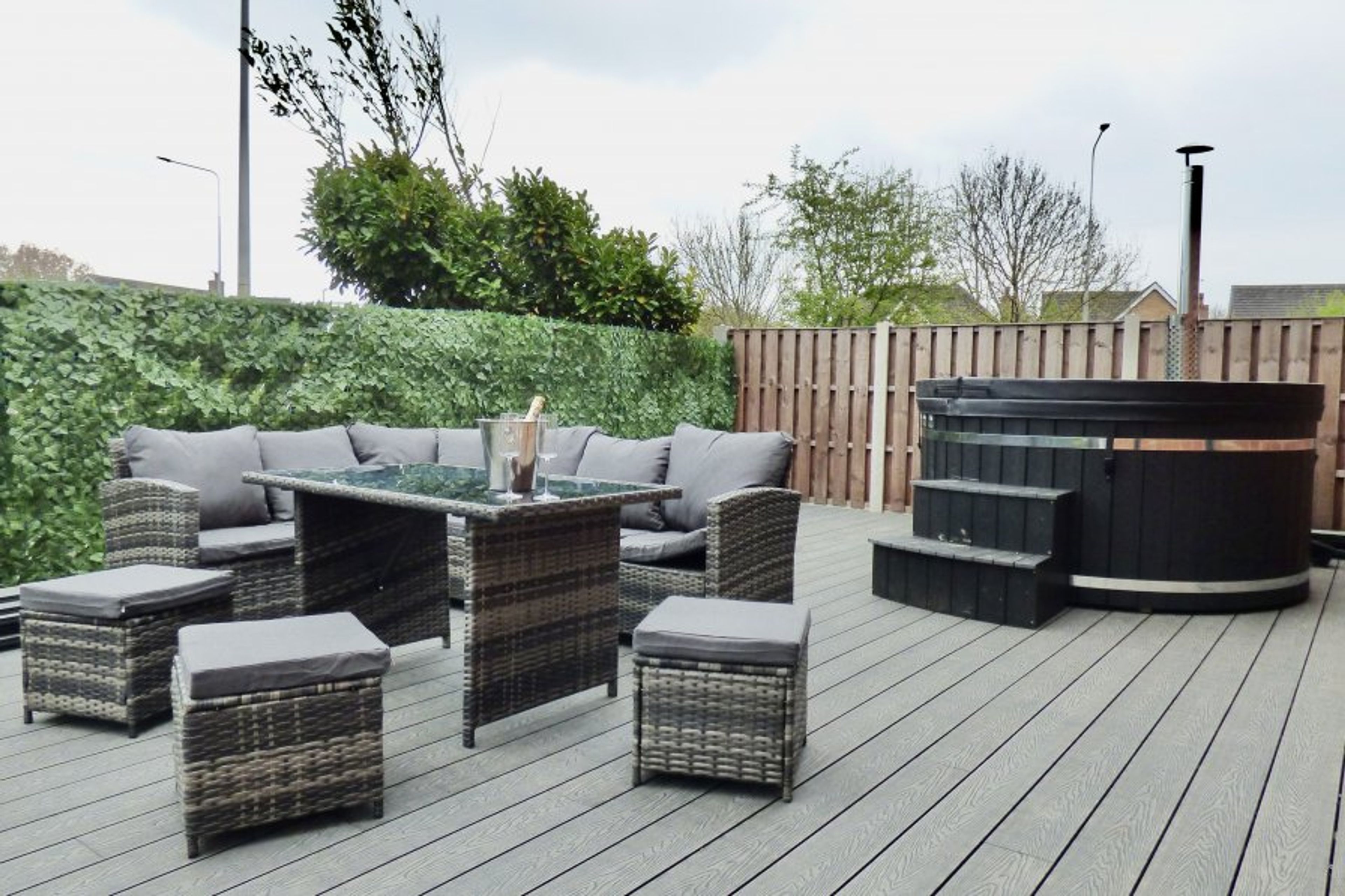 Outdoor seating area with woodfired hot tub