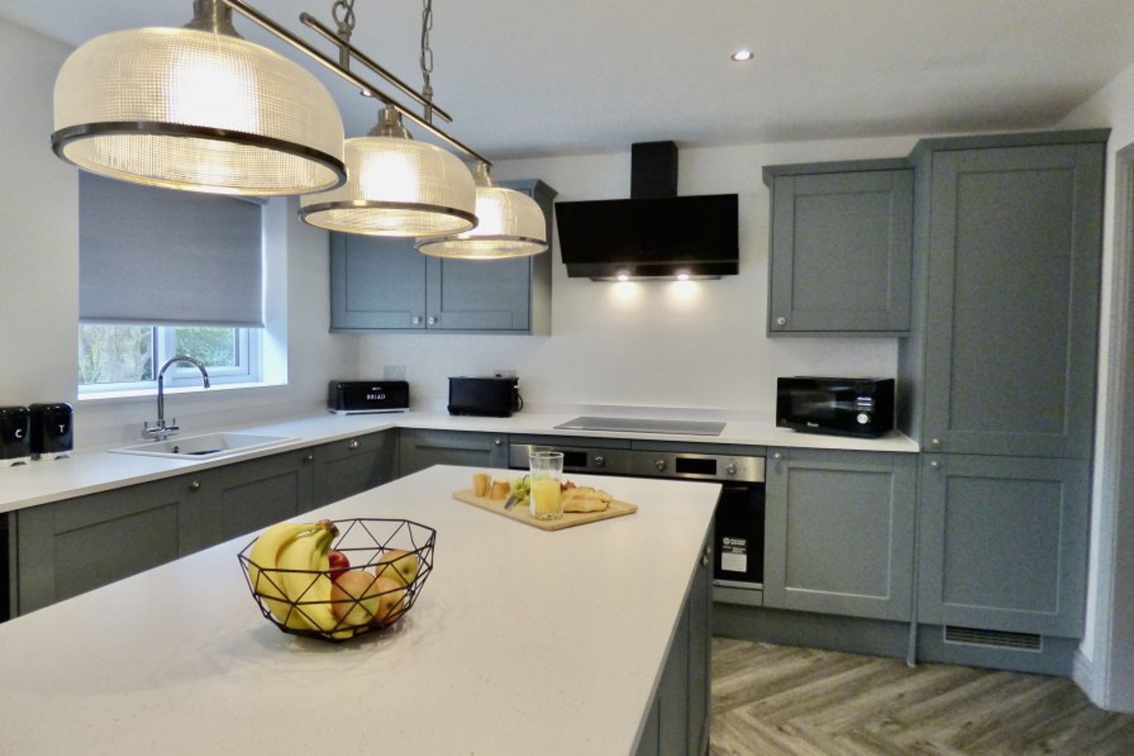 Large kitchen with Island and 2 breakfast stools