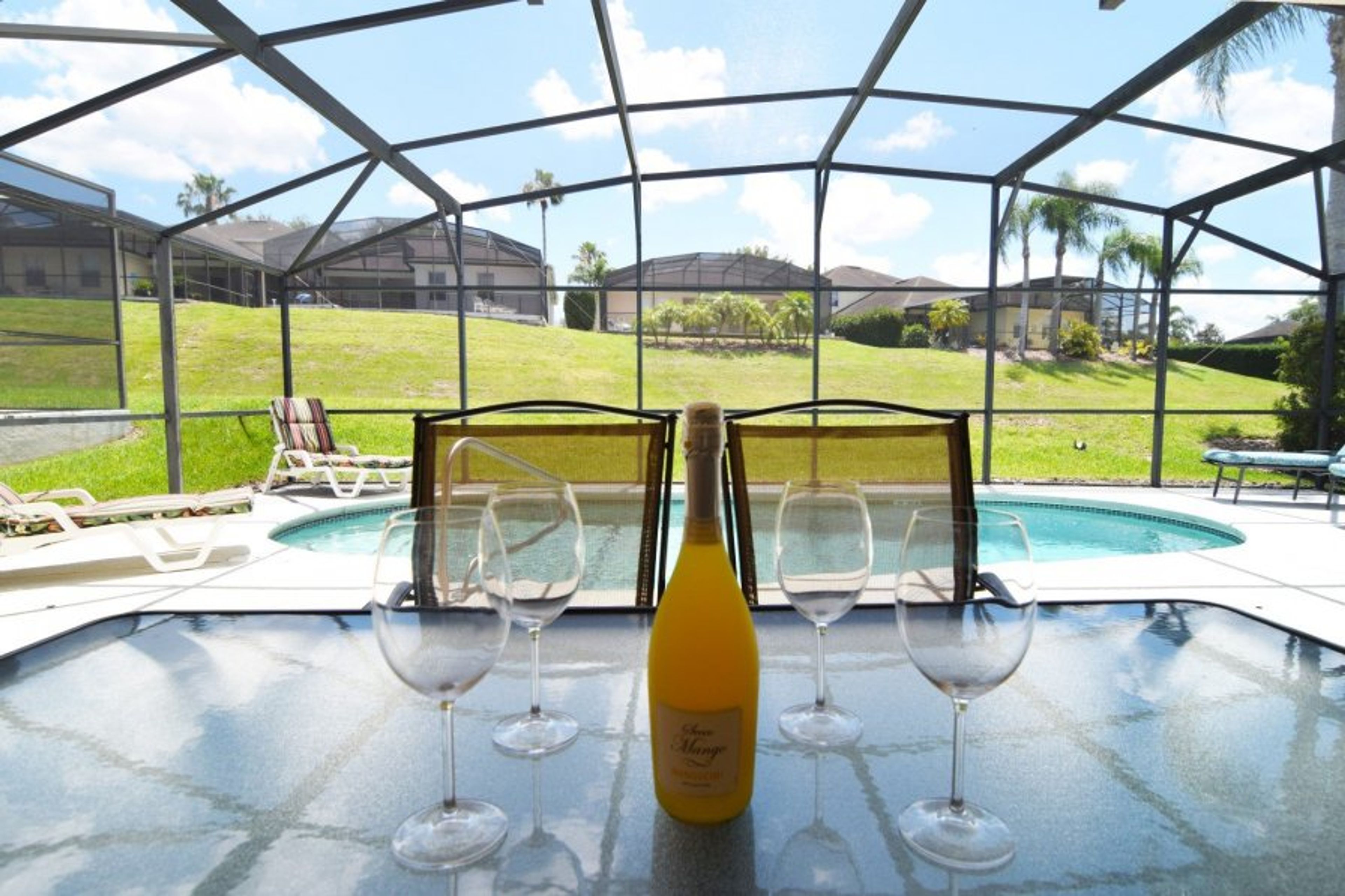 Lovely pool deck with shaded dining area