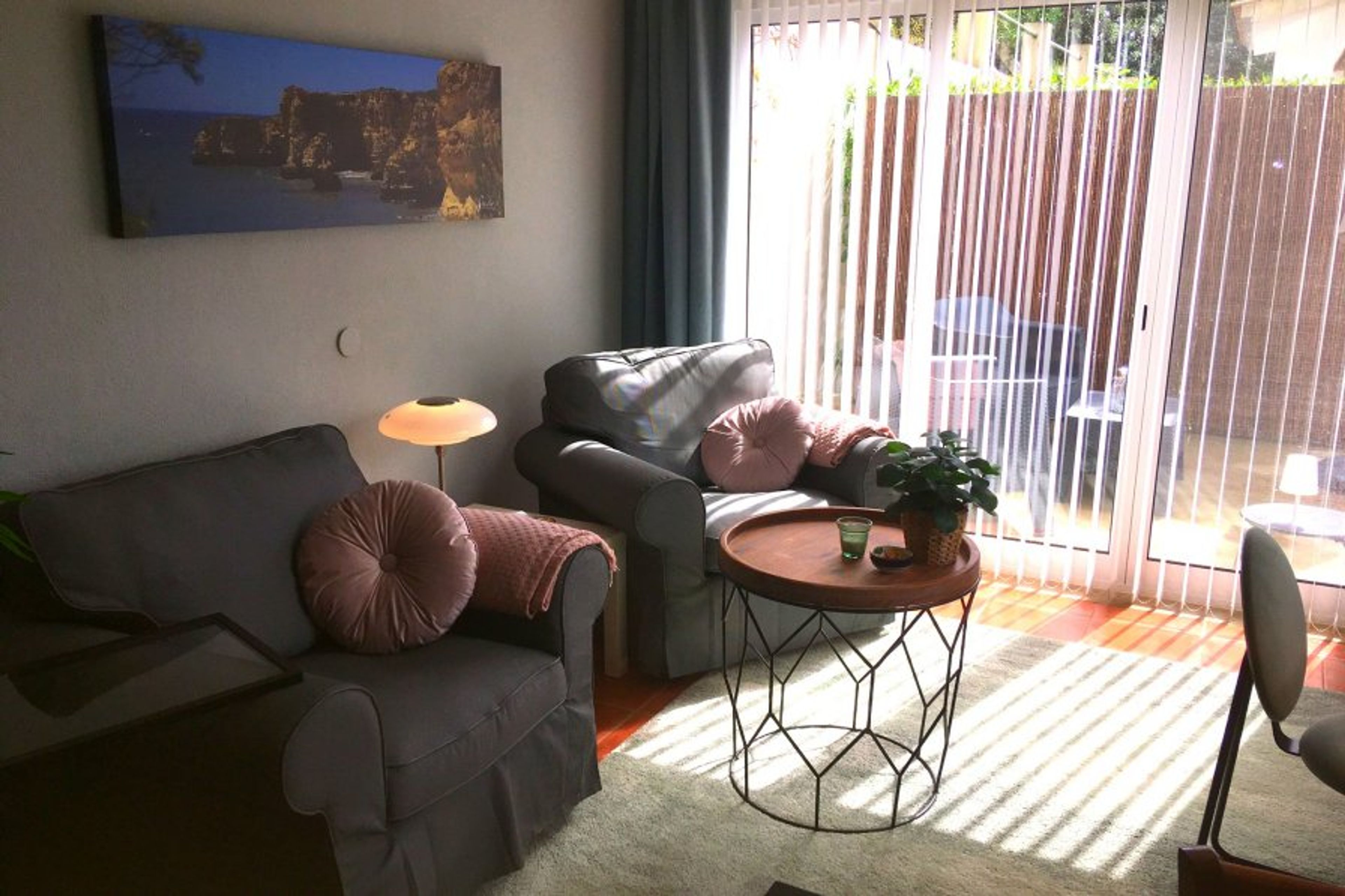 Comfortable armchairs in the living area.