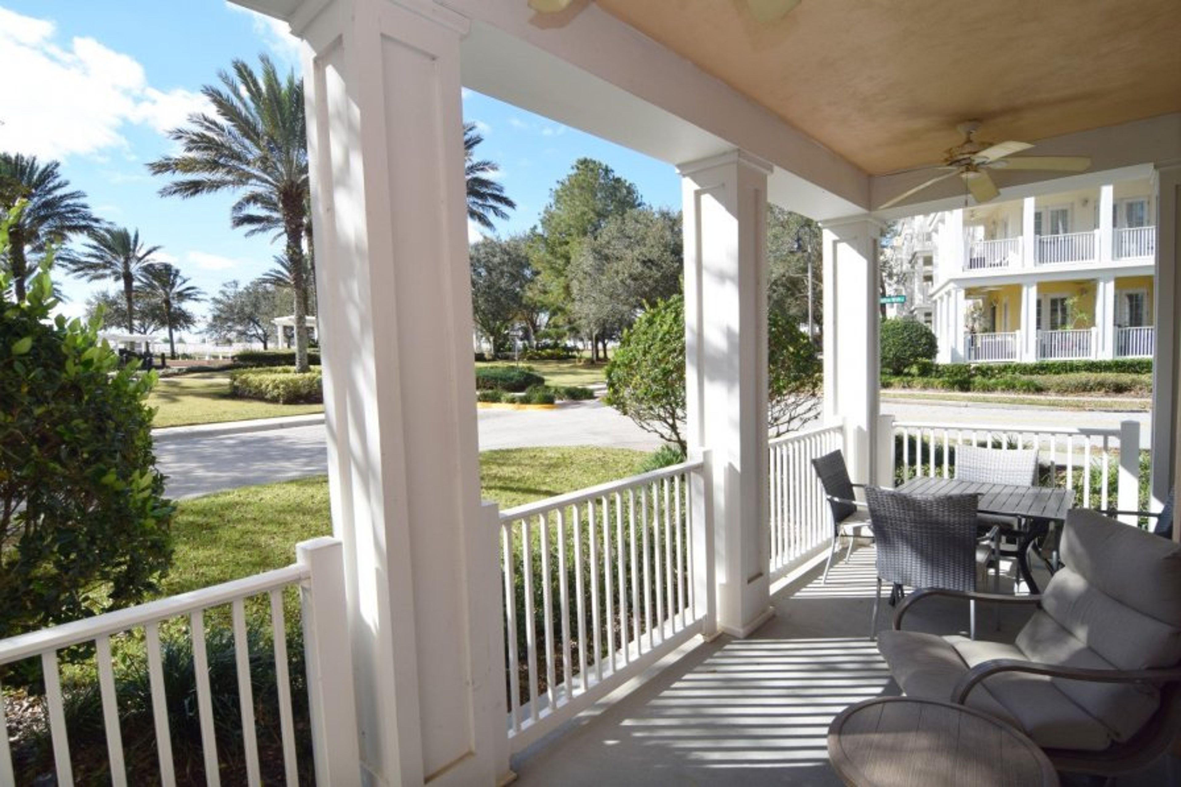 South-facing balcony with comfortable seating & dining area