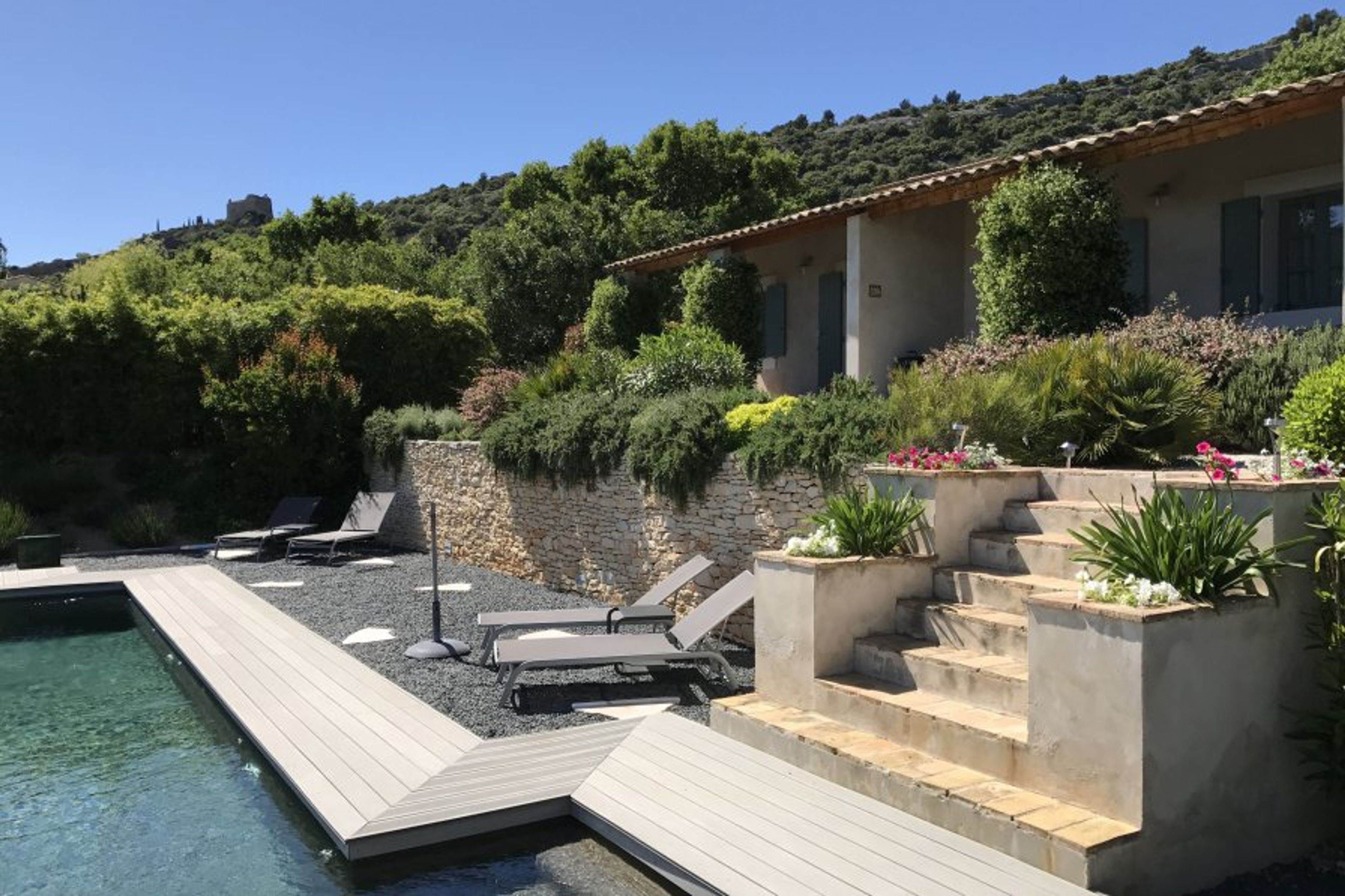 Large sun bathing terrace with parasols