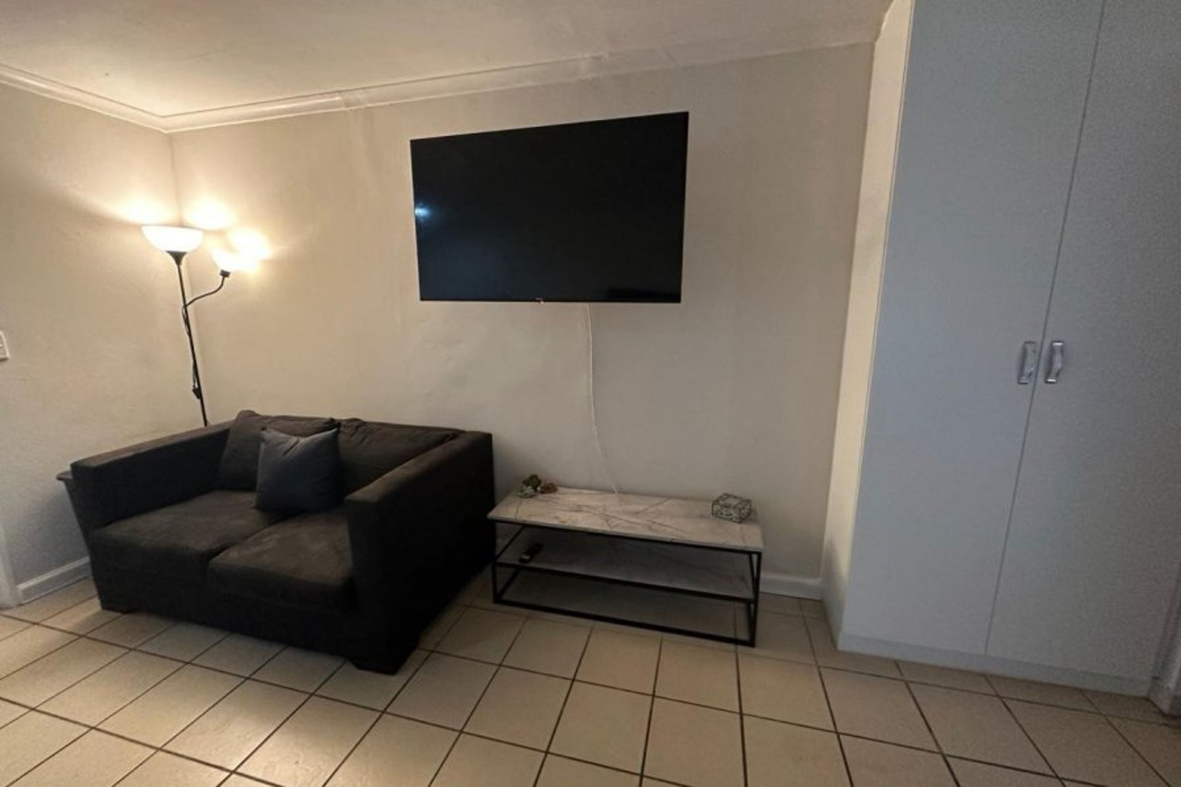 Living area with couch and tv