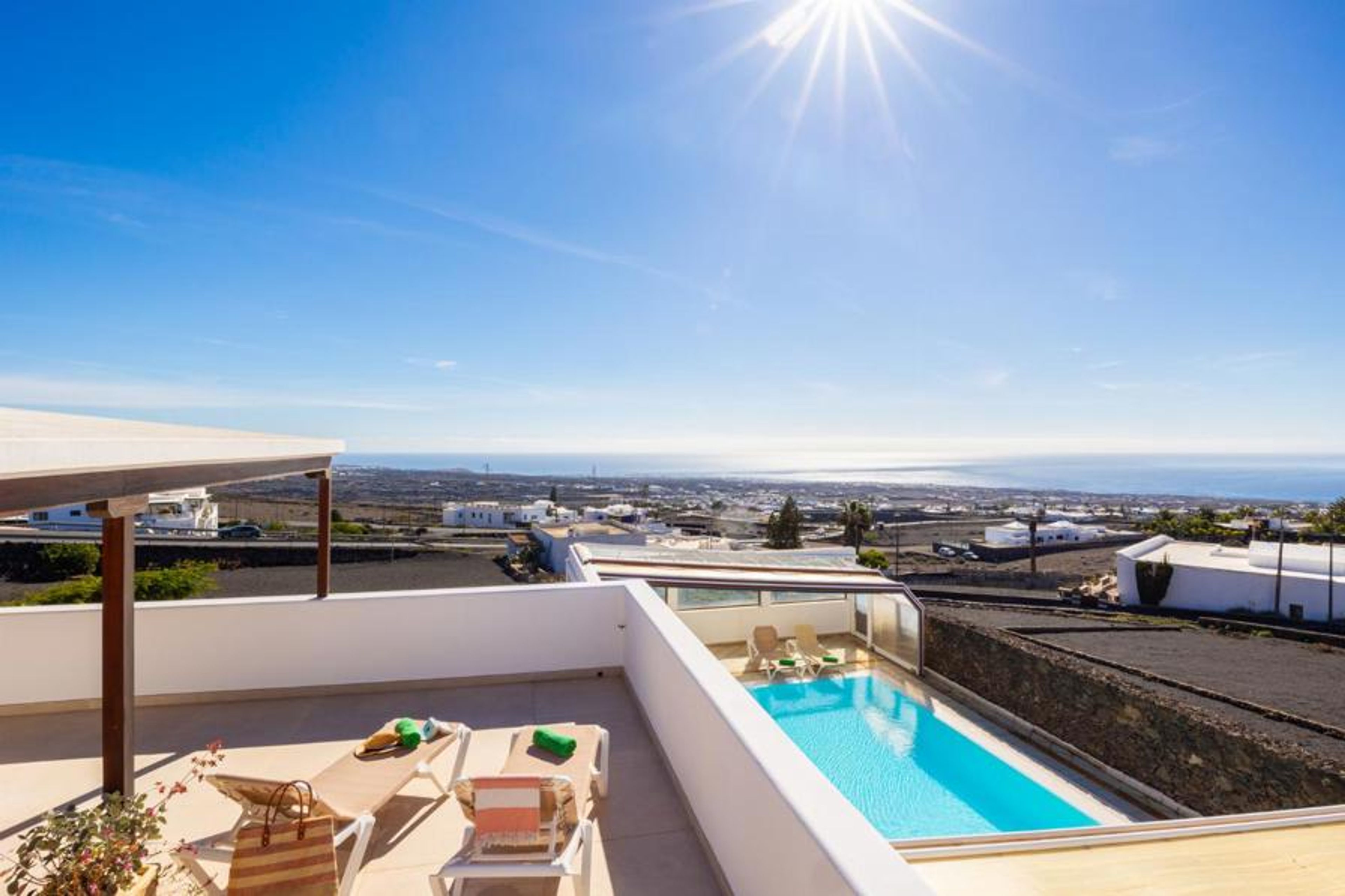 Upper terrace area with sea views