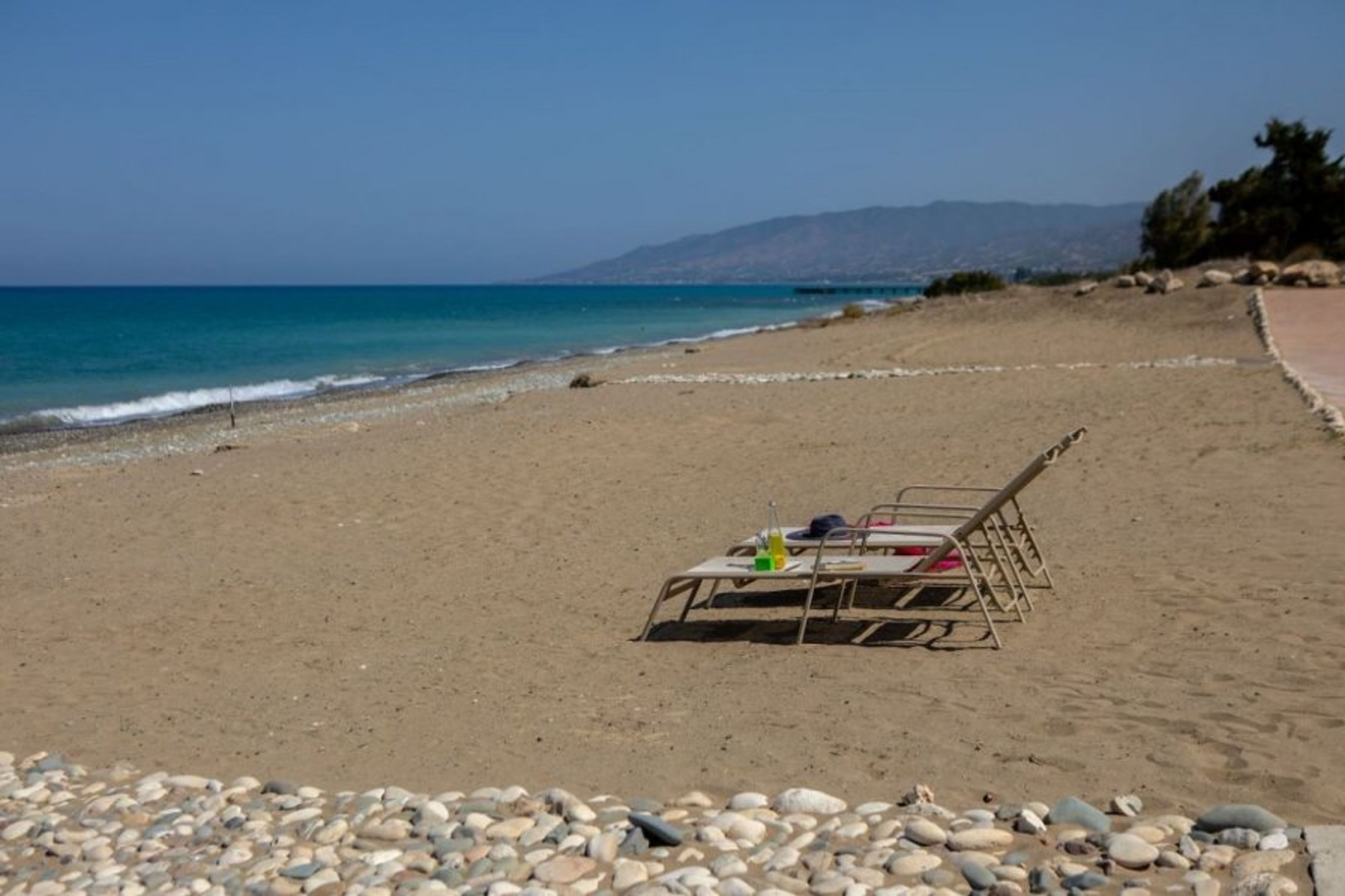 Private Sandy Beach access with sun loungers