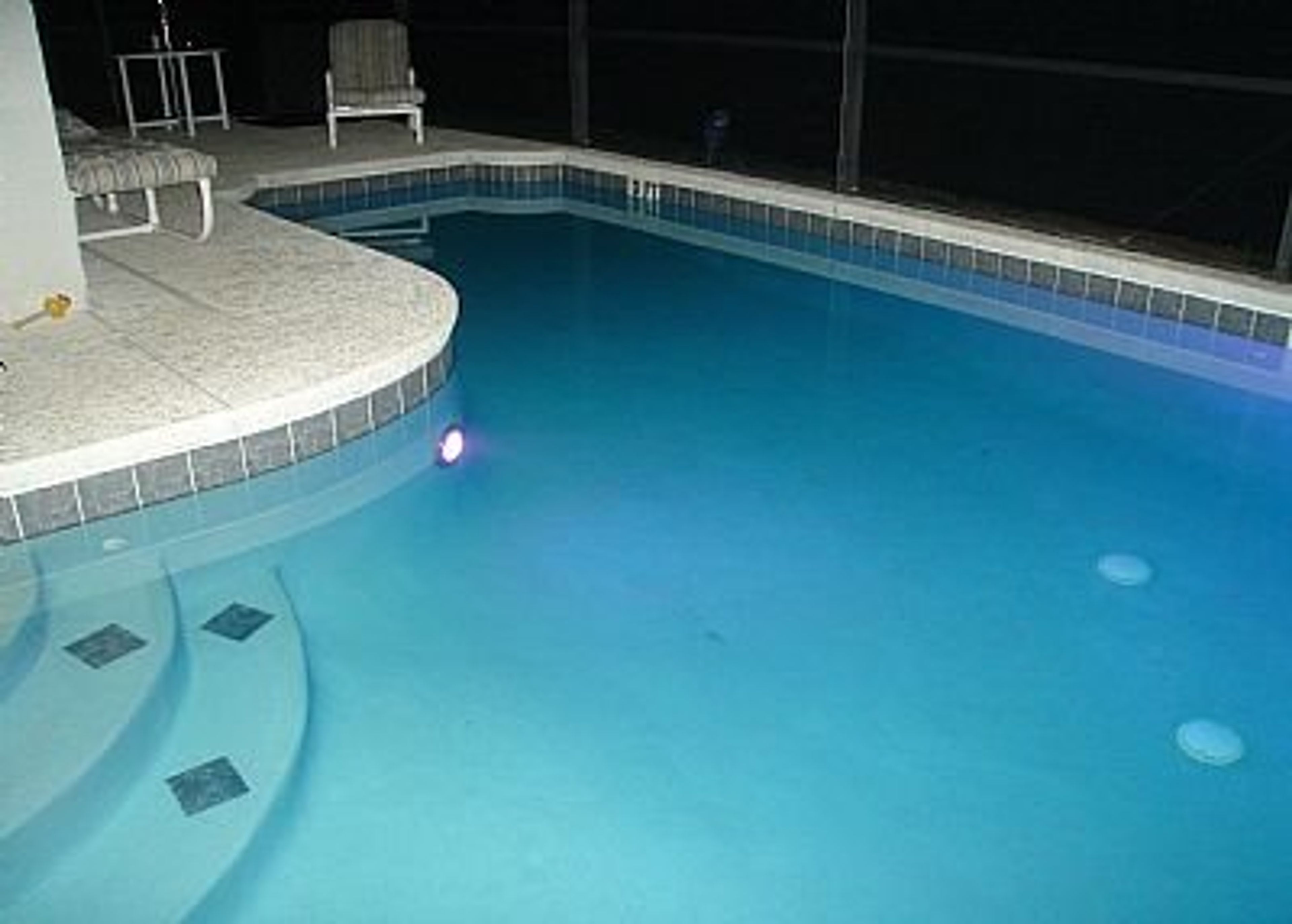 colour changing pool at night