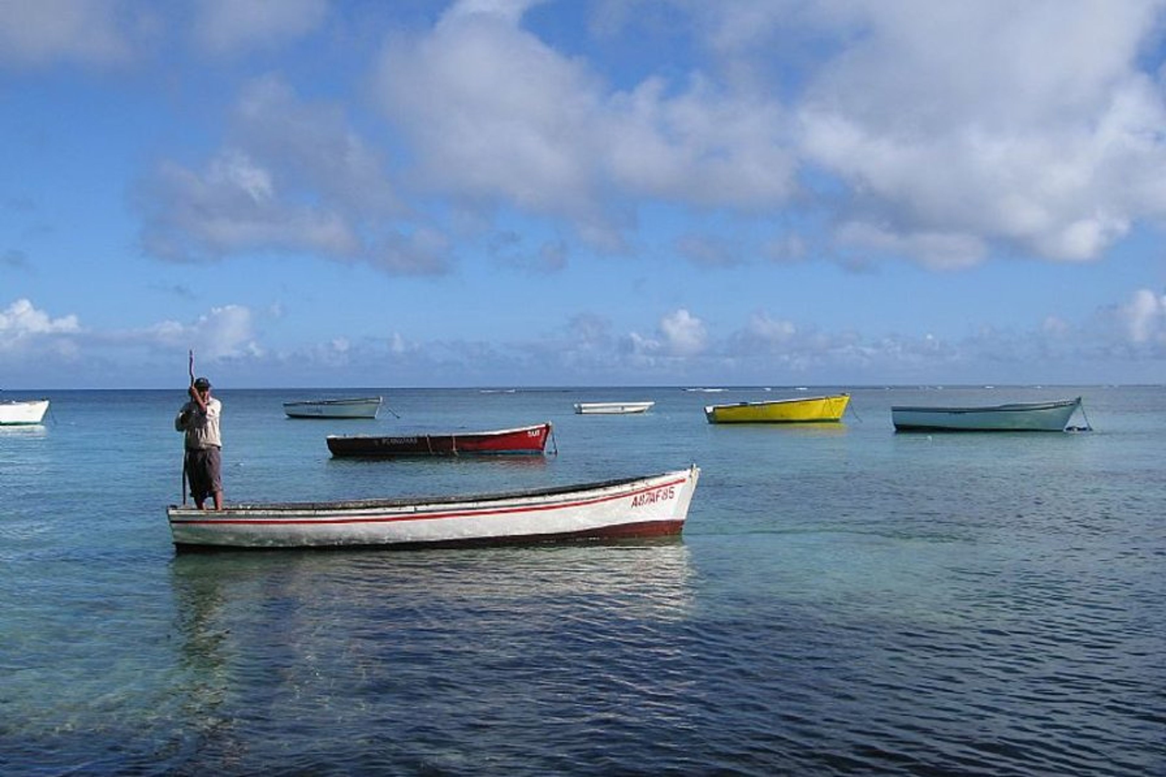 Trou aux Biches Local Going To Work
