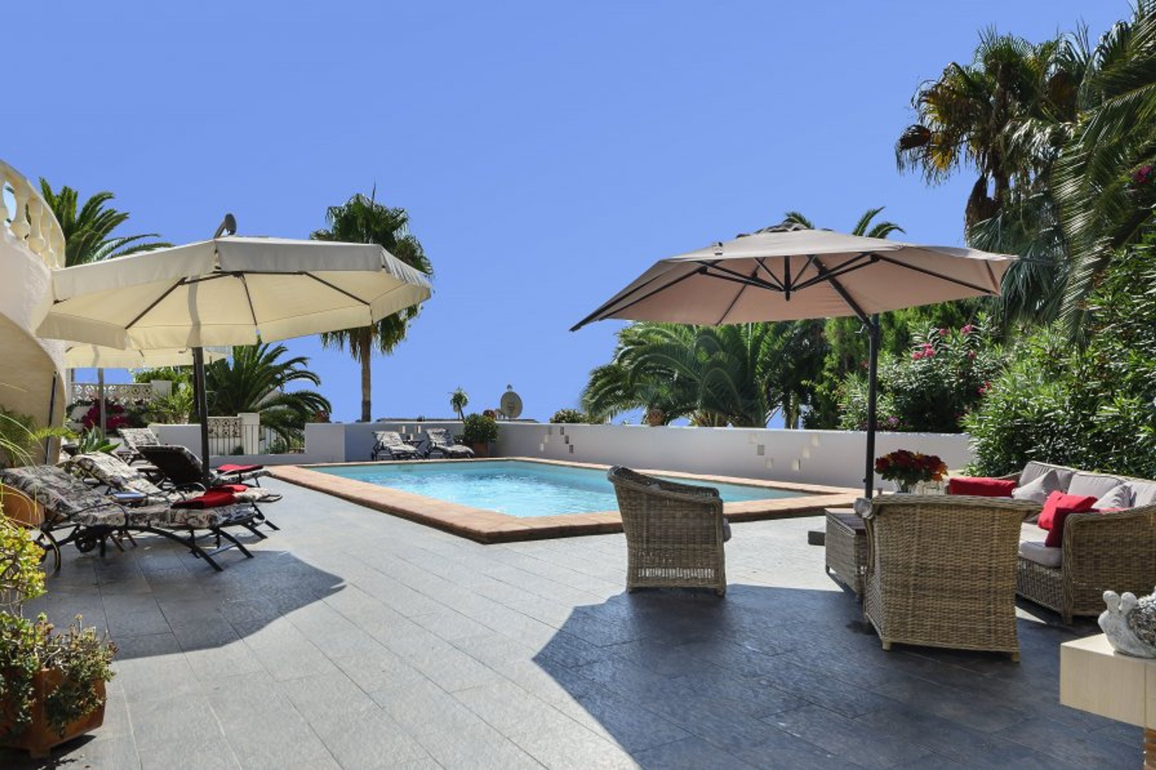 Large sun terracce around the heated private pool